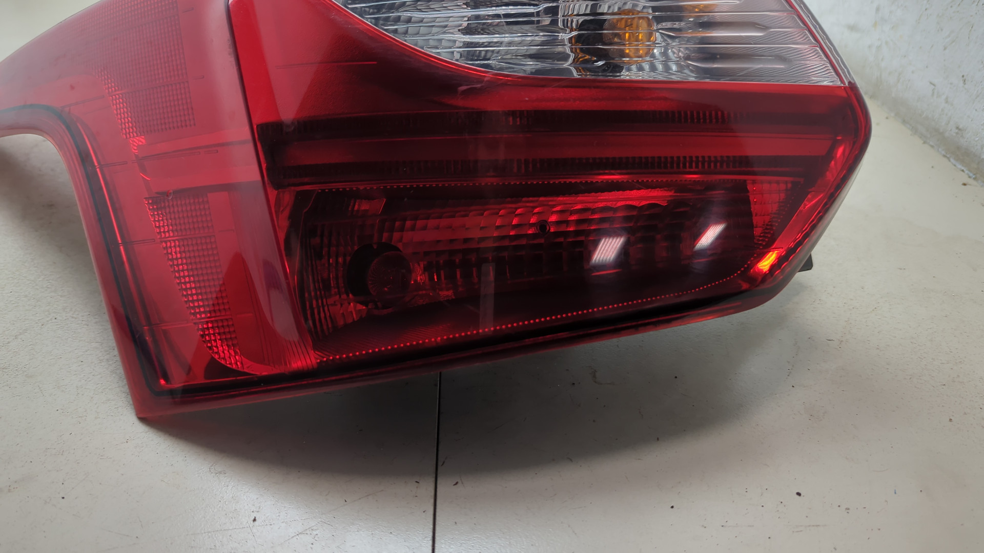 Фонарь задний левый