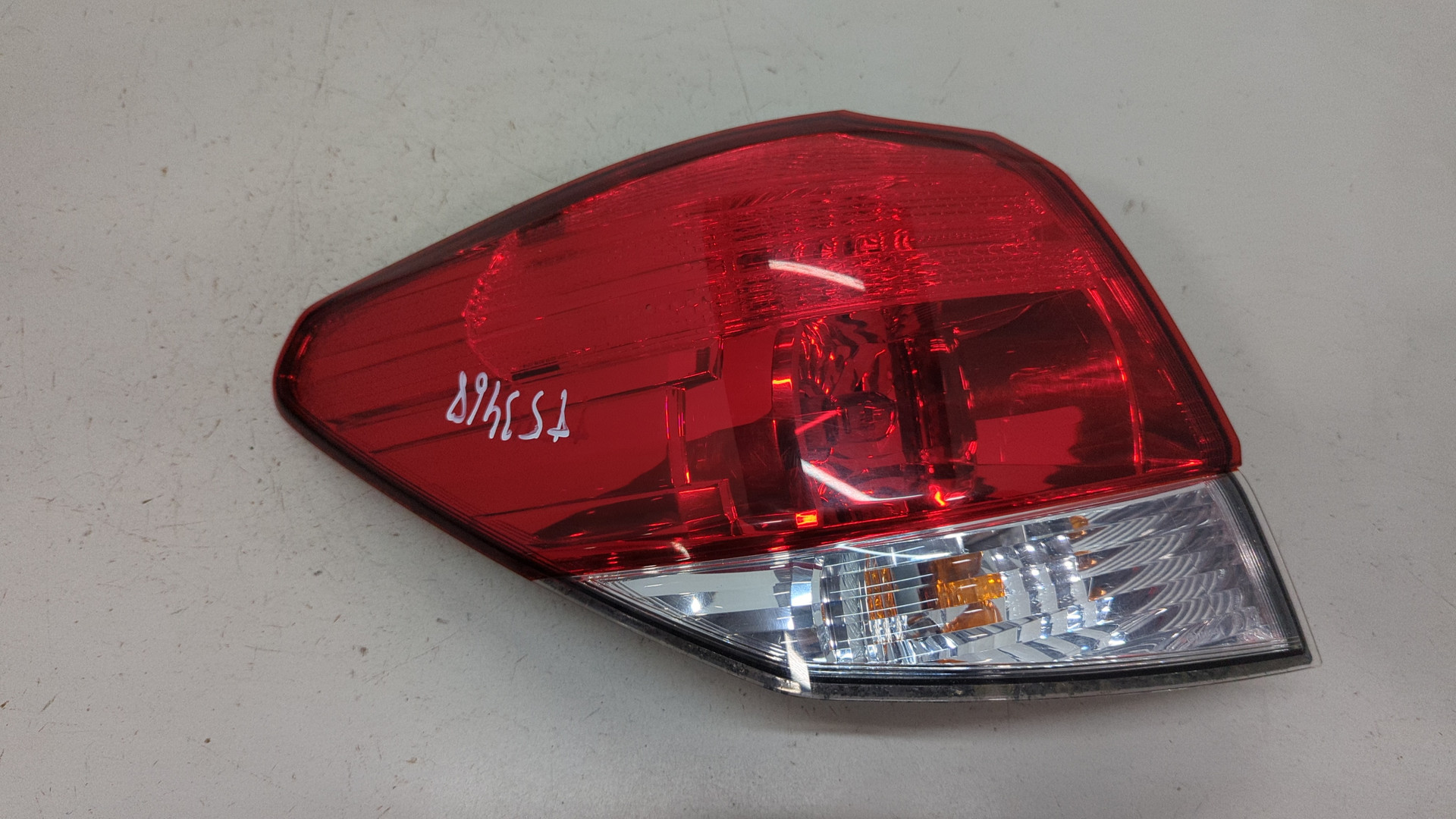 Фонарь задний левый