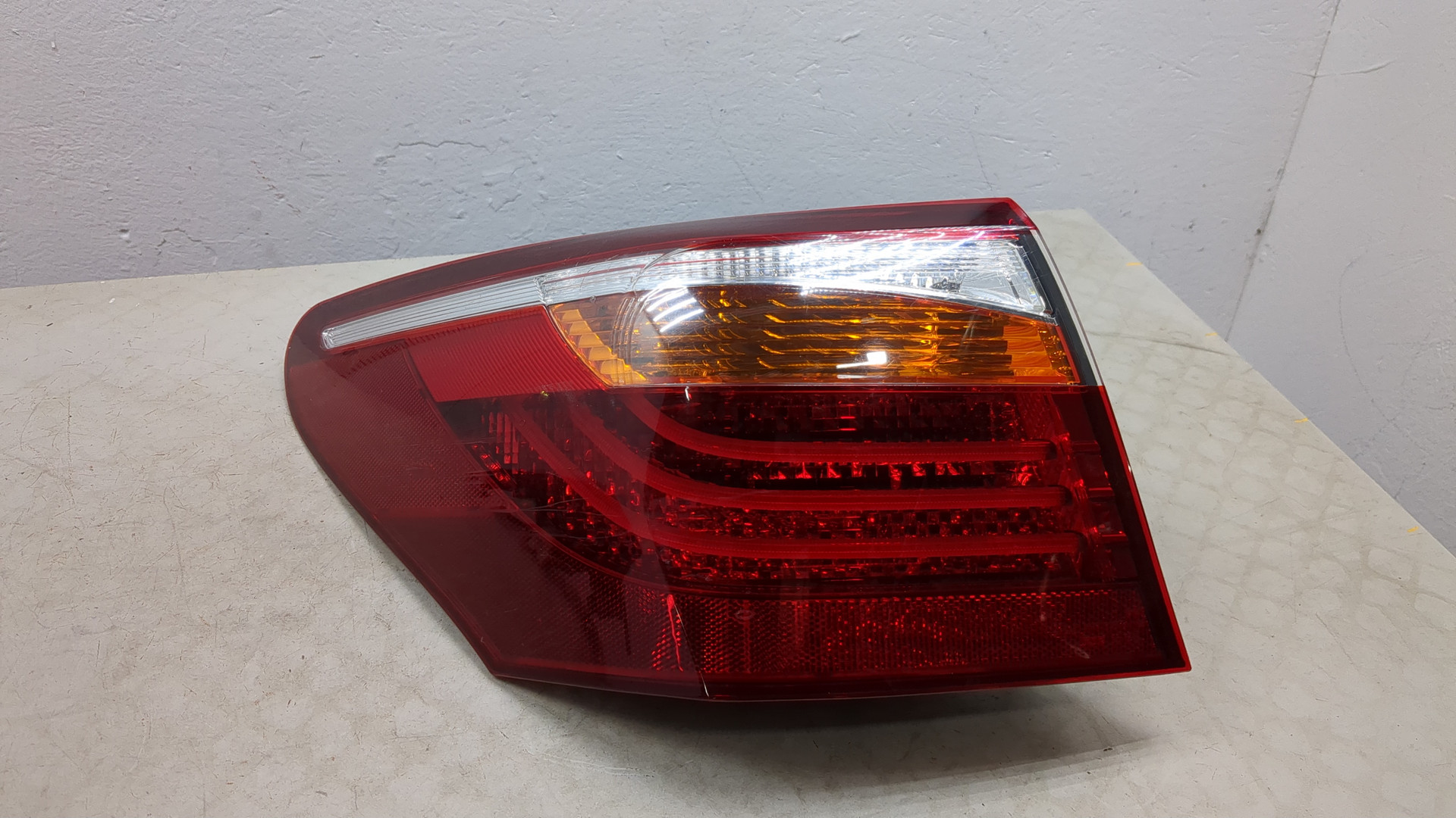 Фонарь задний левый