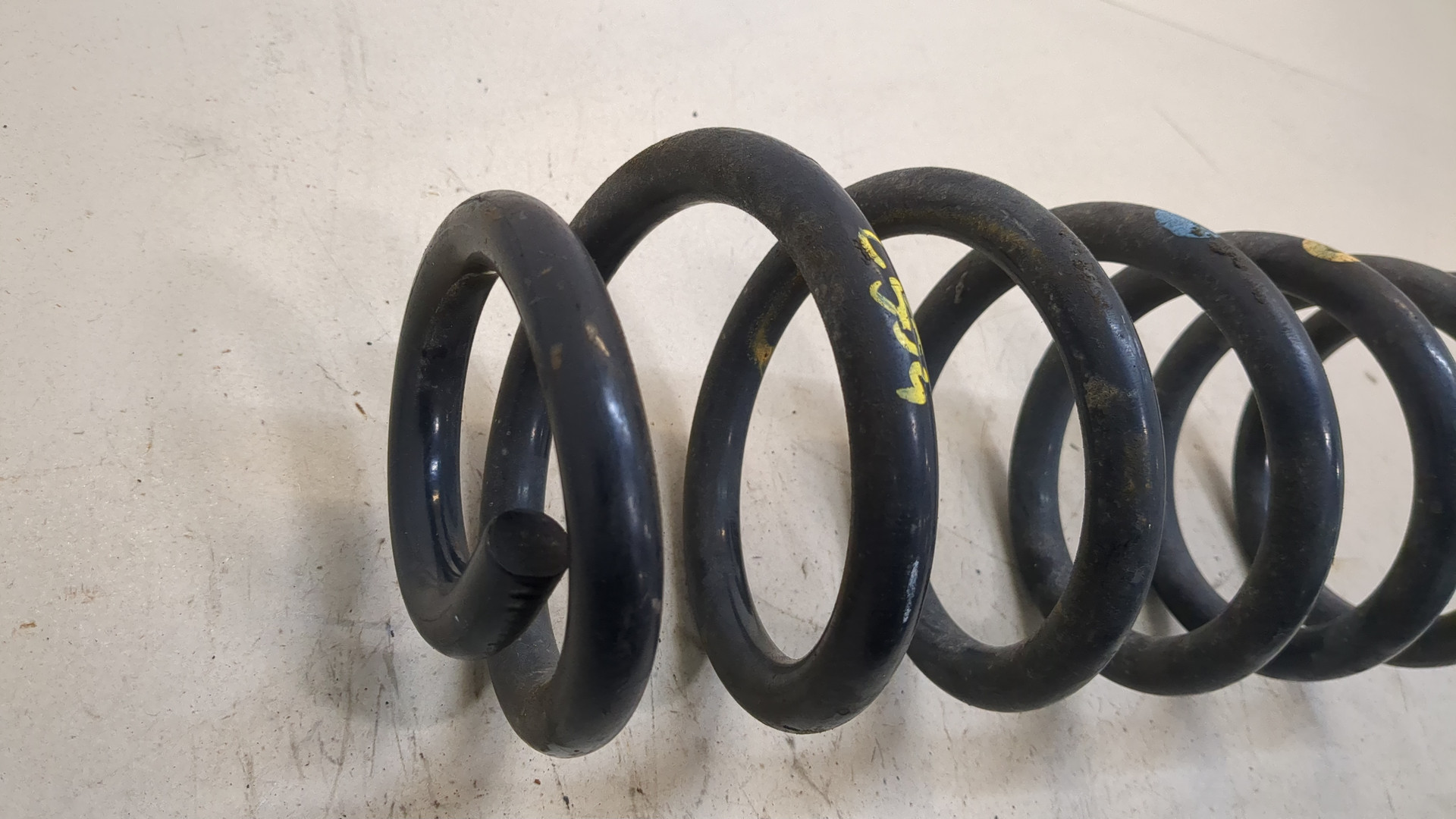 Пружина задняя