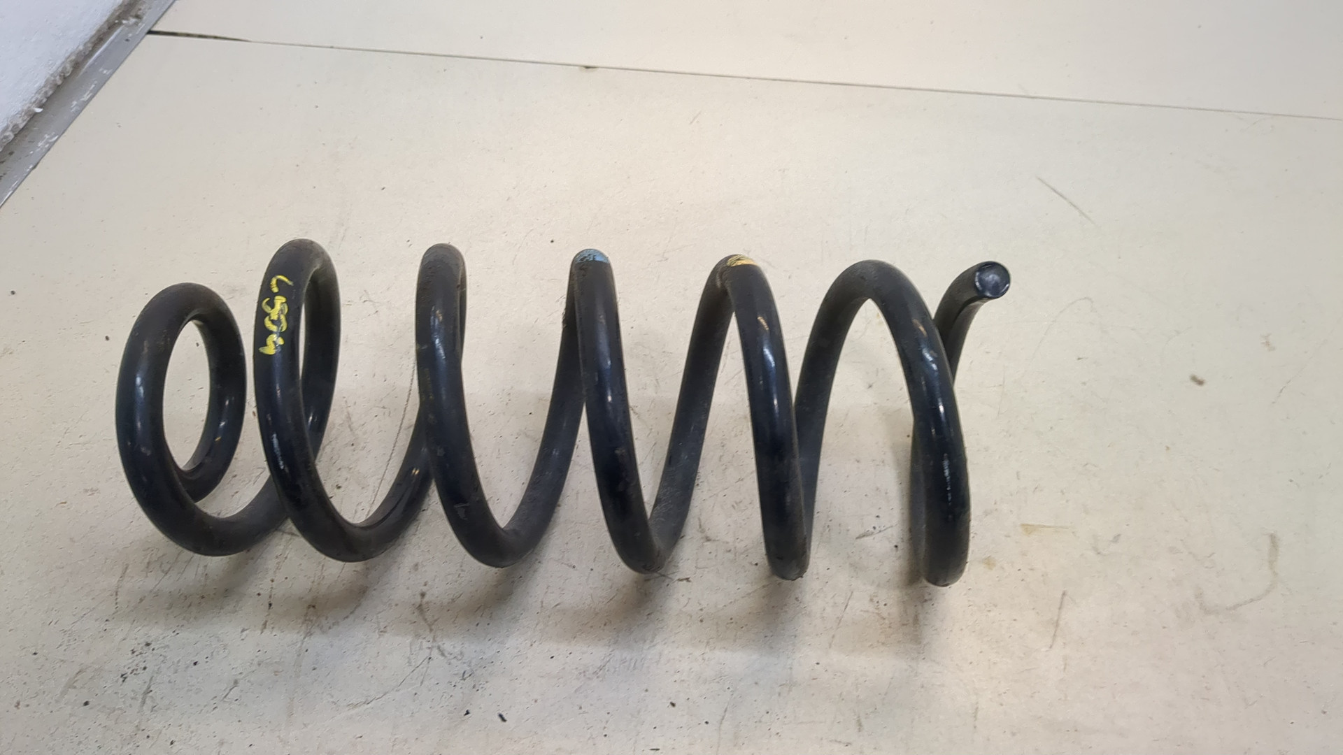 Пружина задняя