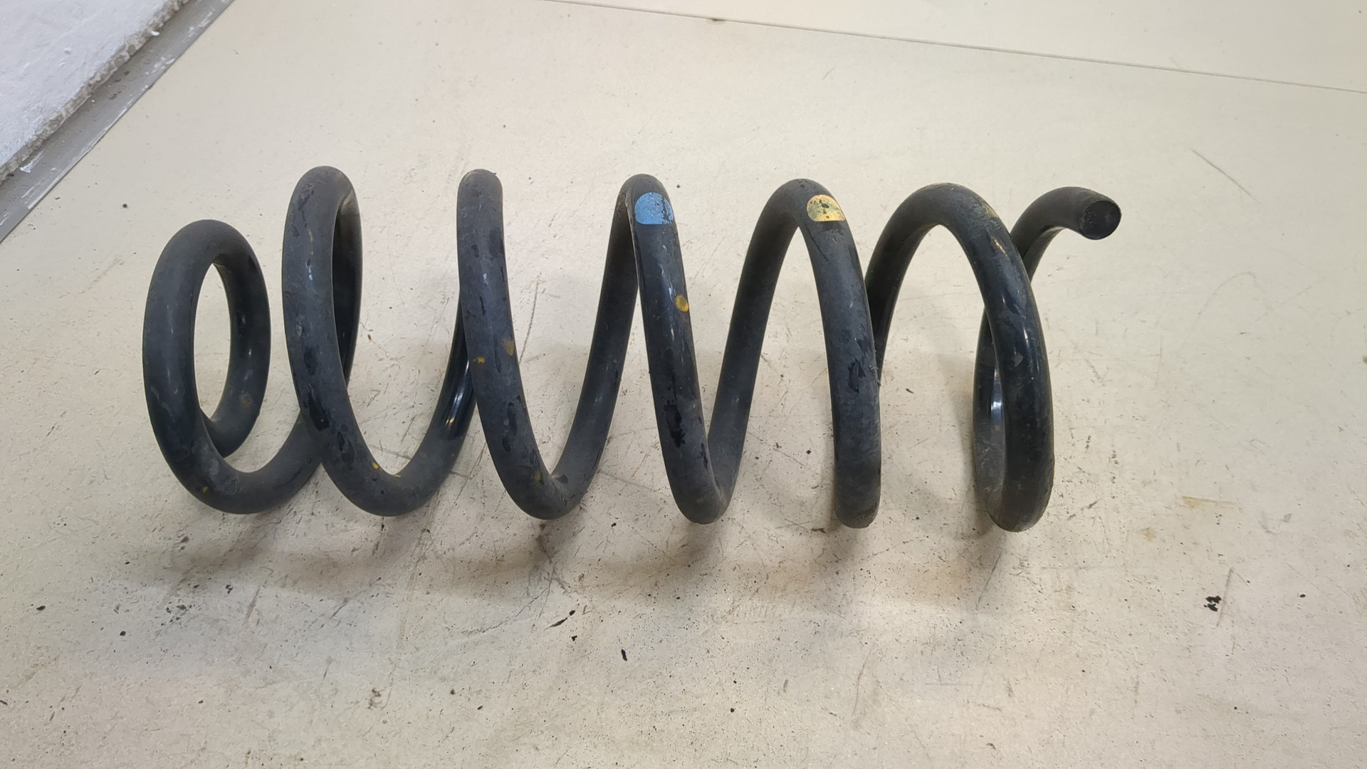 Пружина задняя