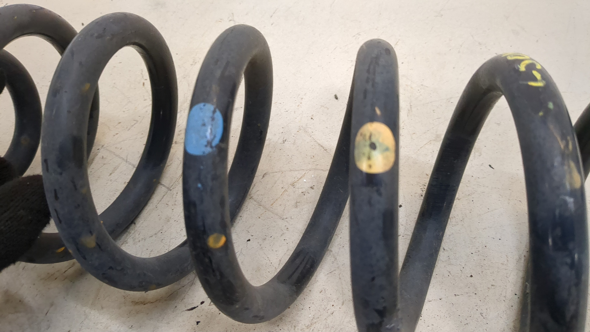 Пружина задняя