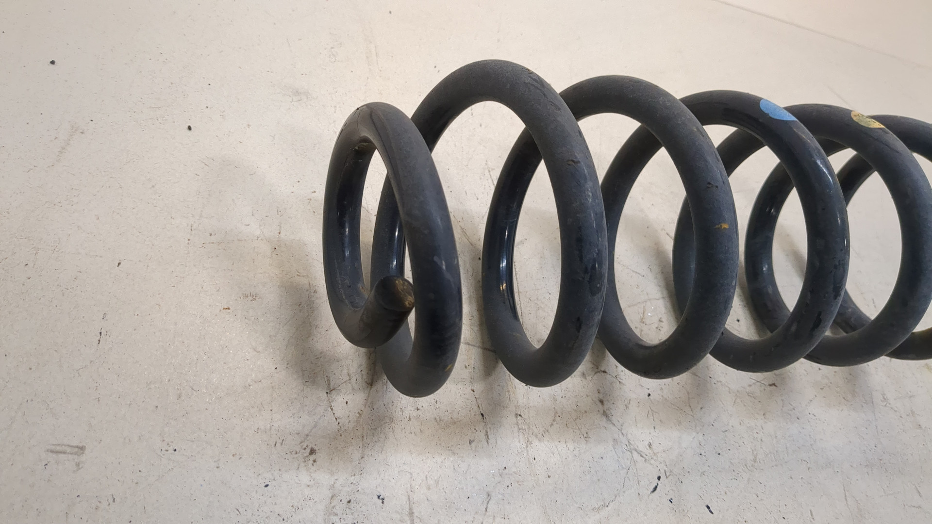 Пружина задняя