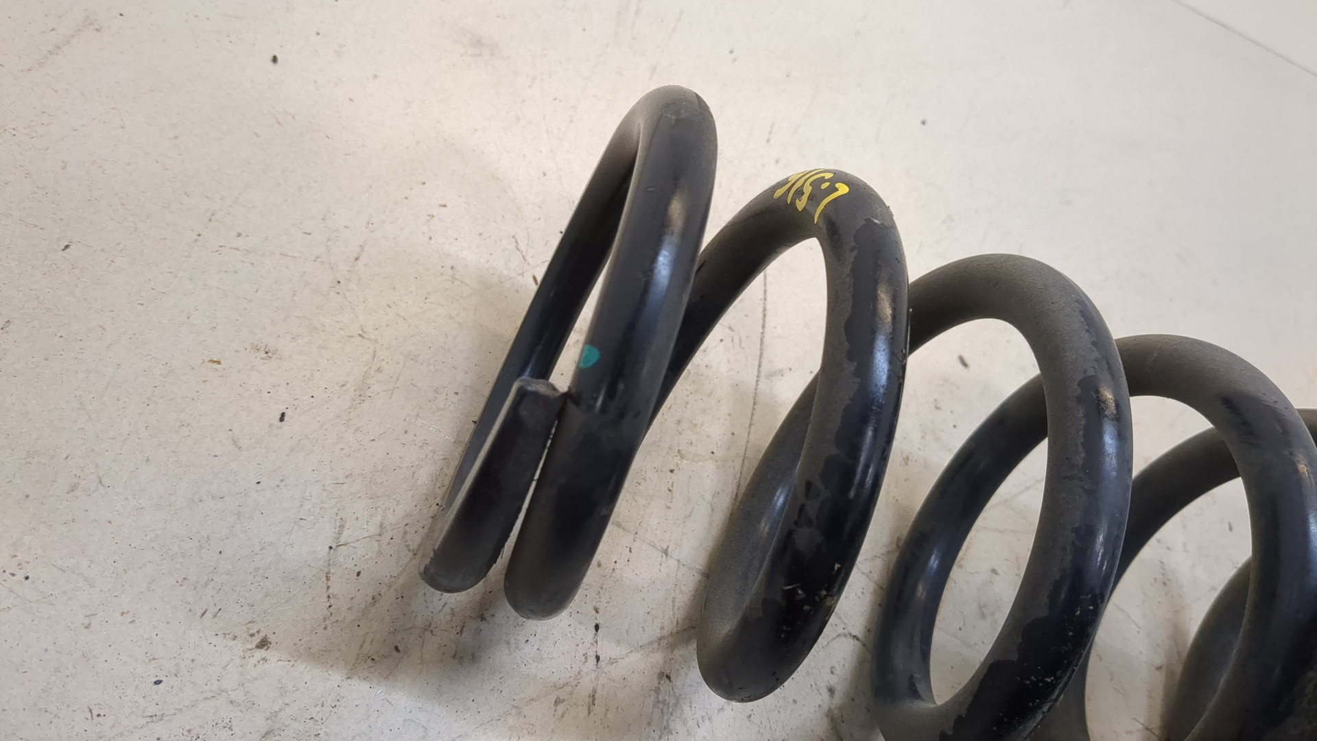 Пружина задняя