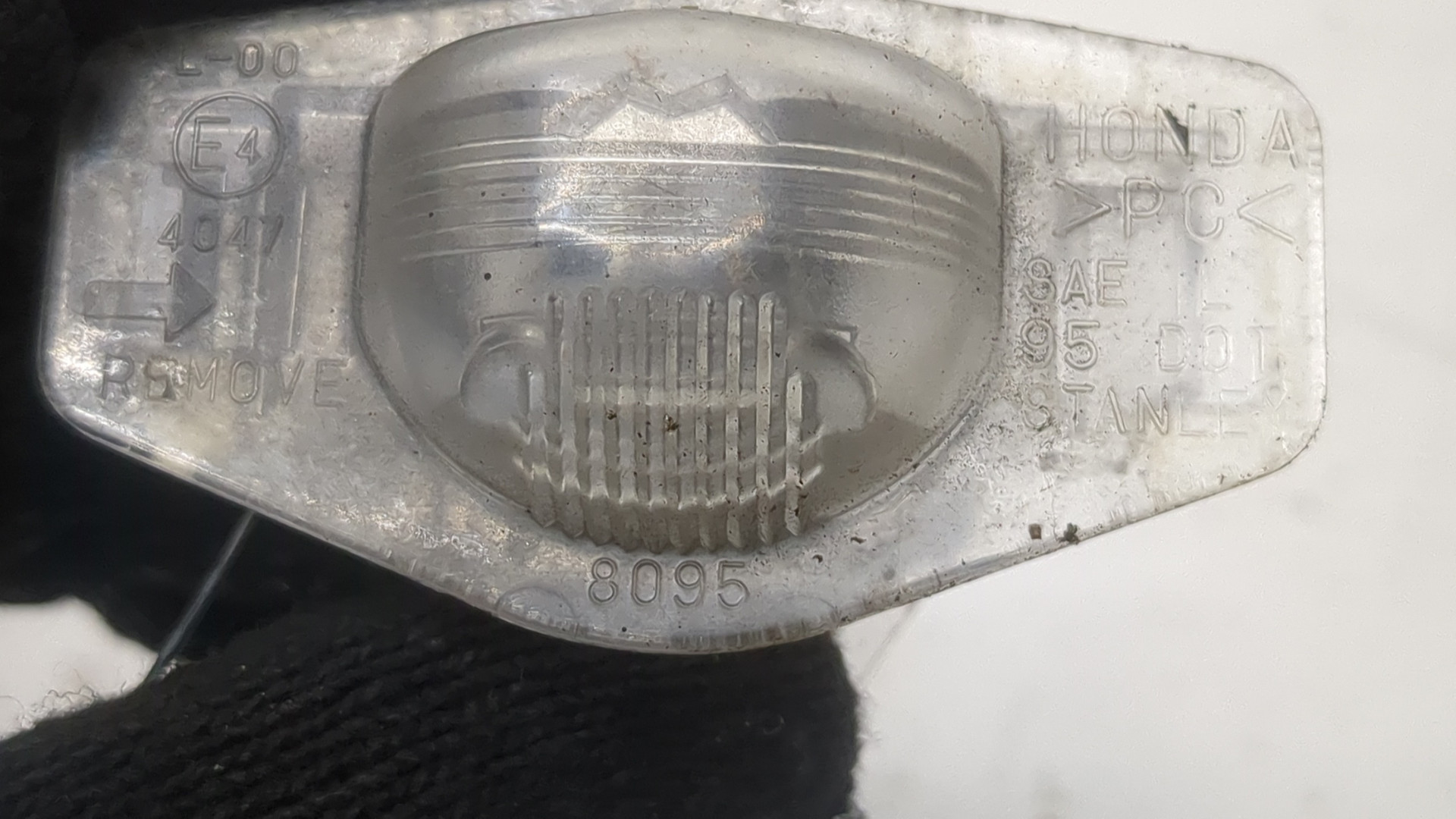 Фонарь подсветки номера