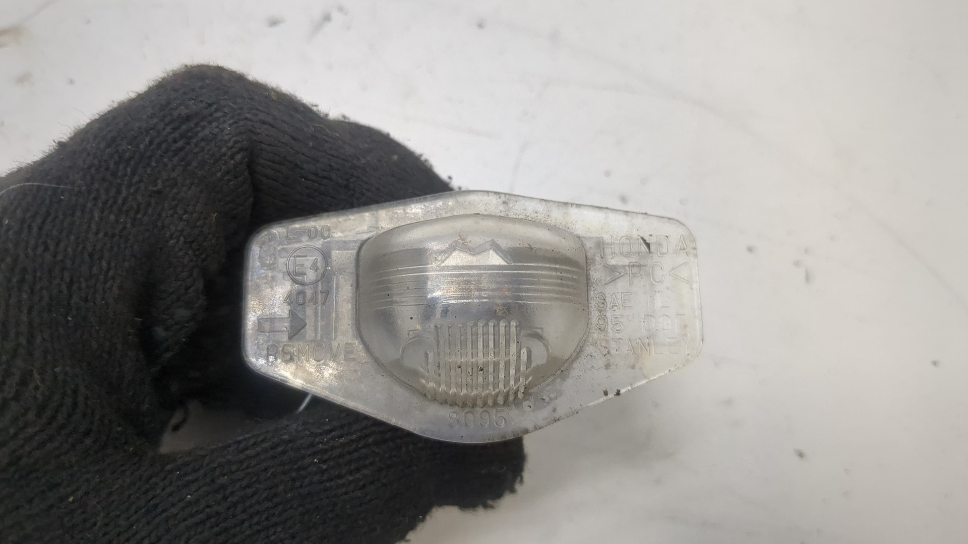 Фонарь подсветки номера