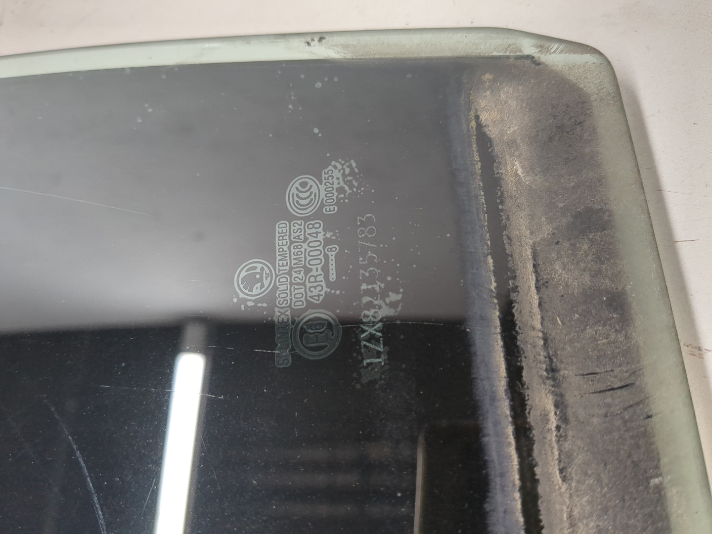 Стекло двери задней левой