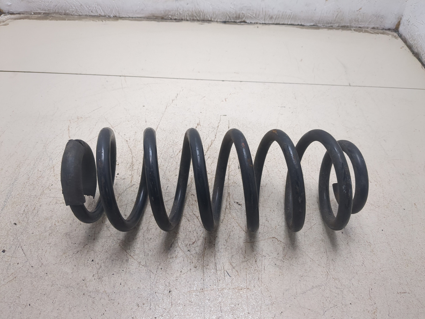 Пружина задняя