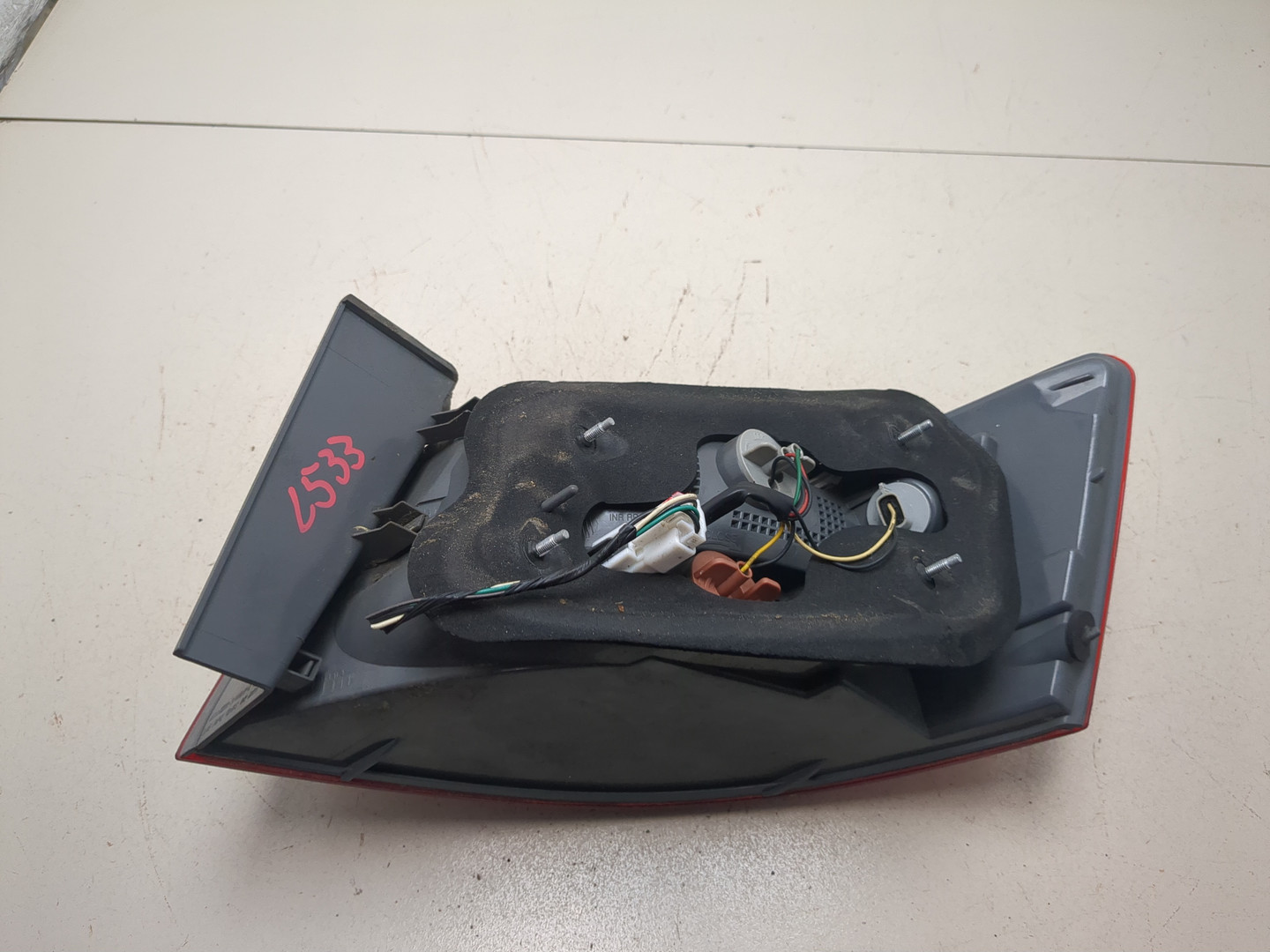 Фонарь задний левый