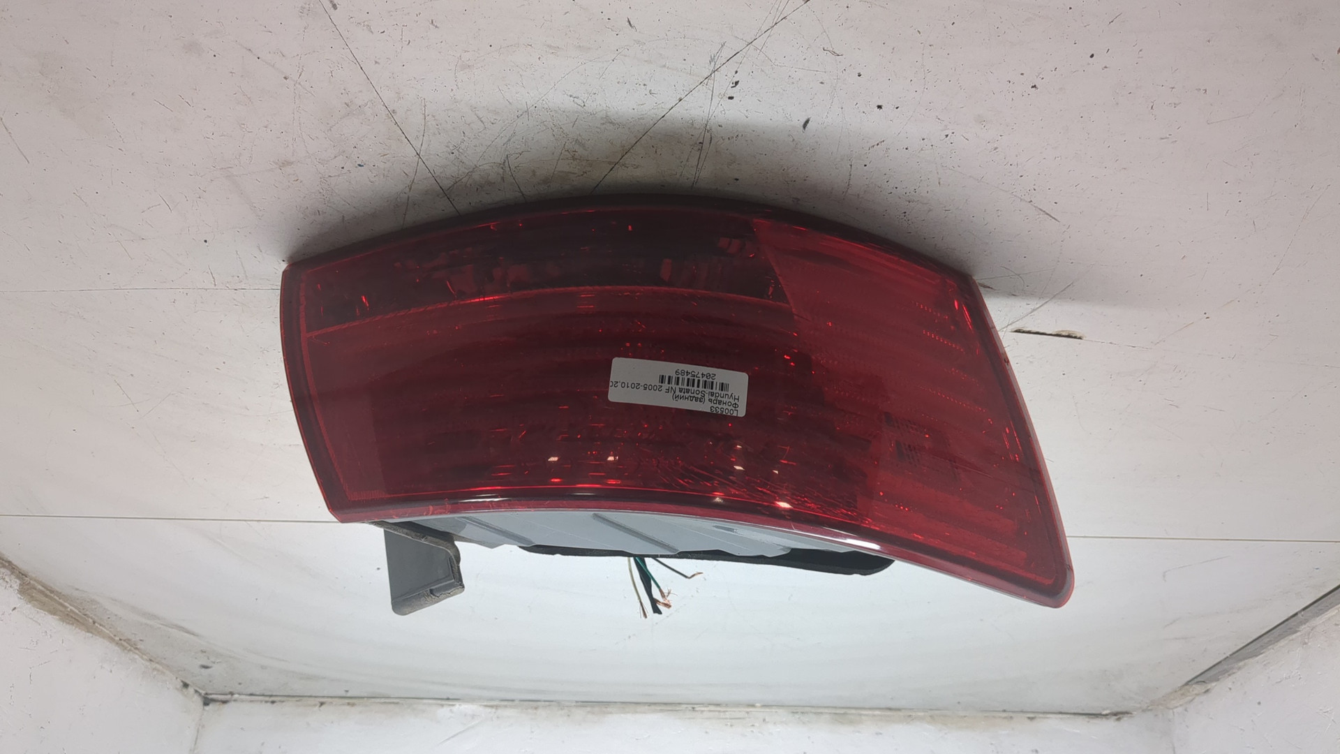 Фонарь задний левый