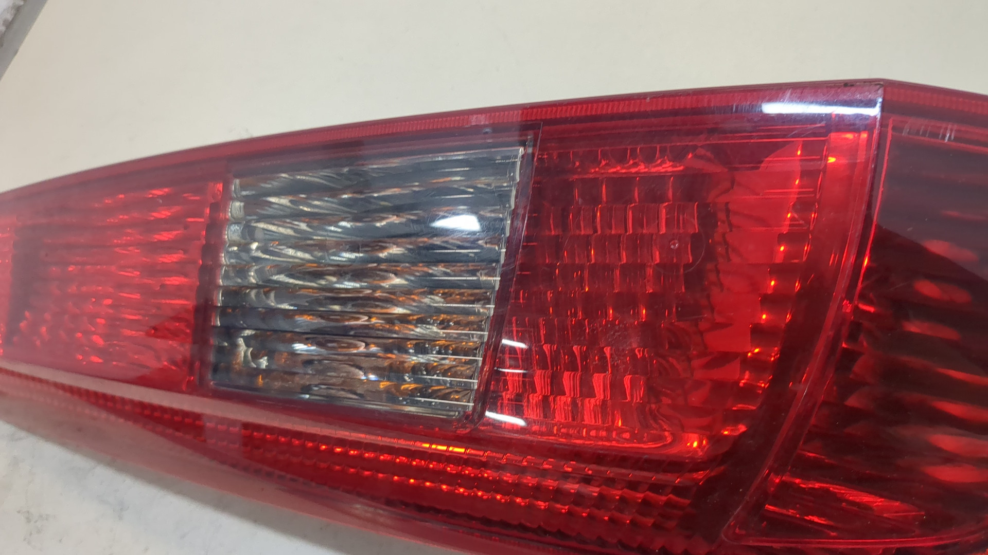 Фонарь задний левый