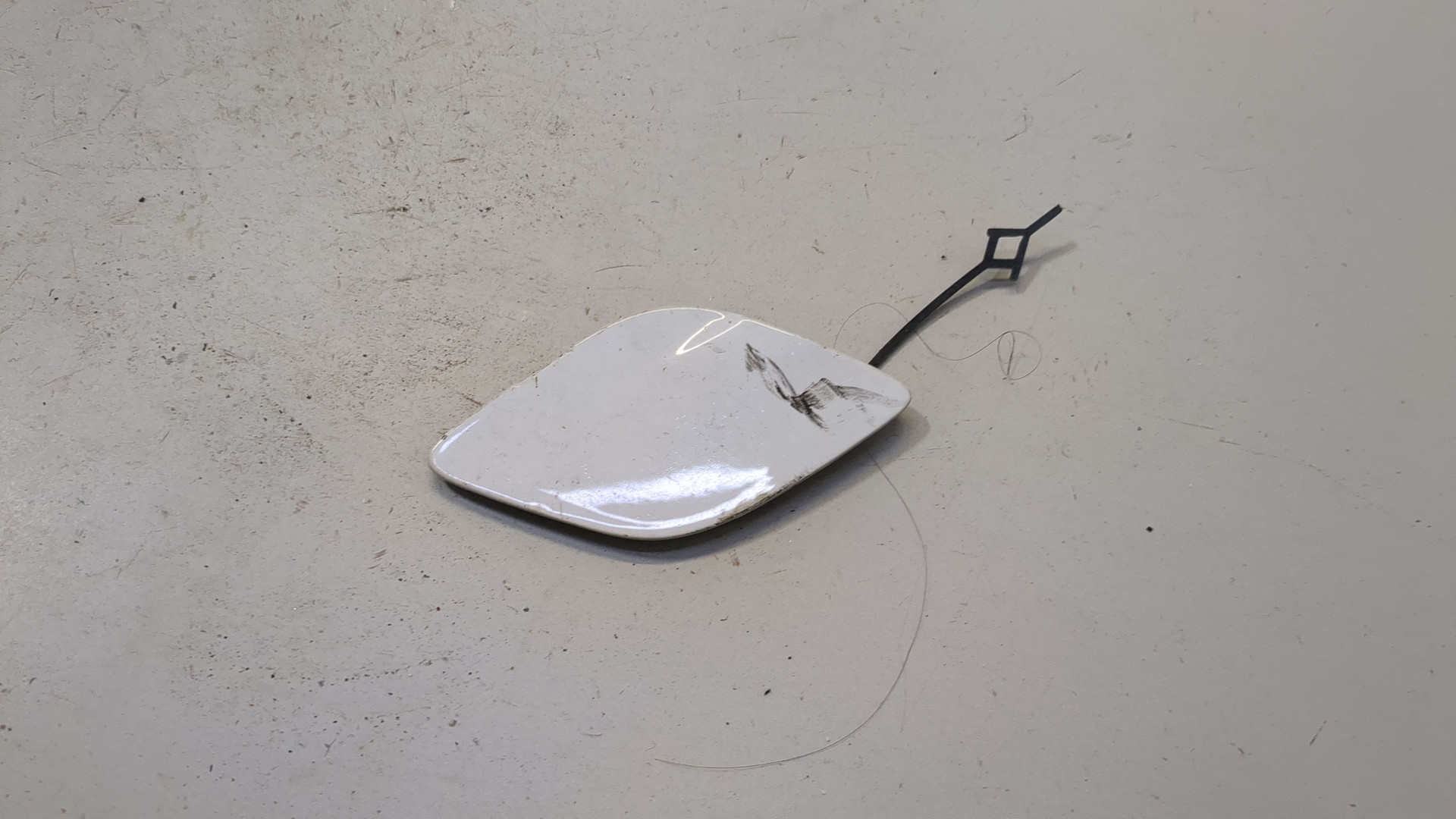 Заглушка буксировочного крюка