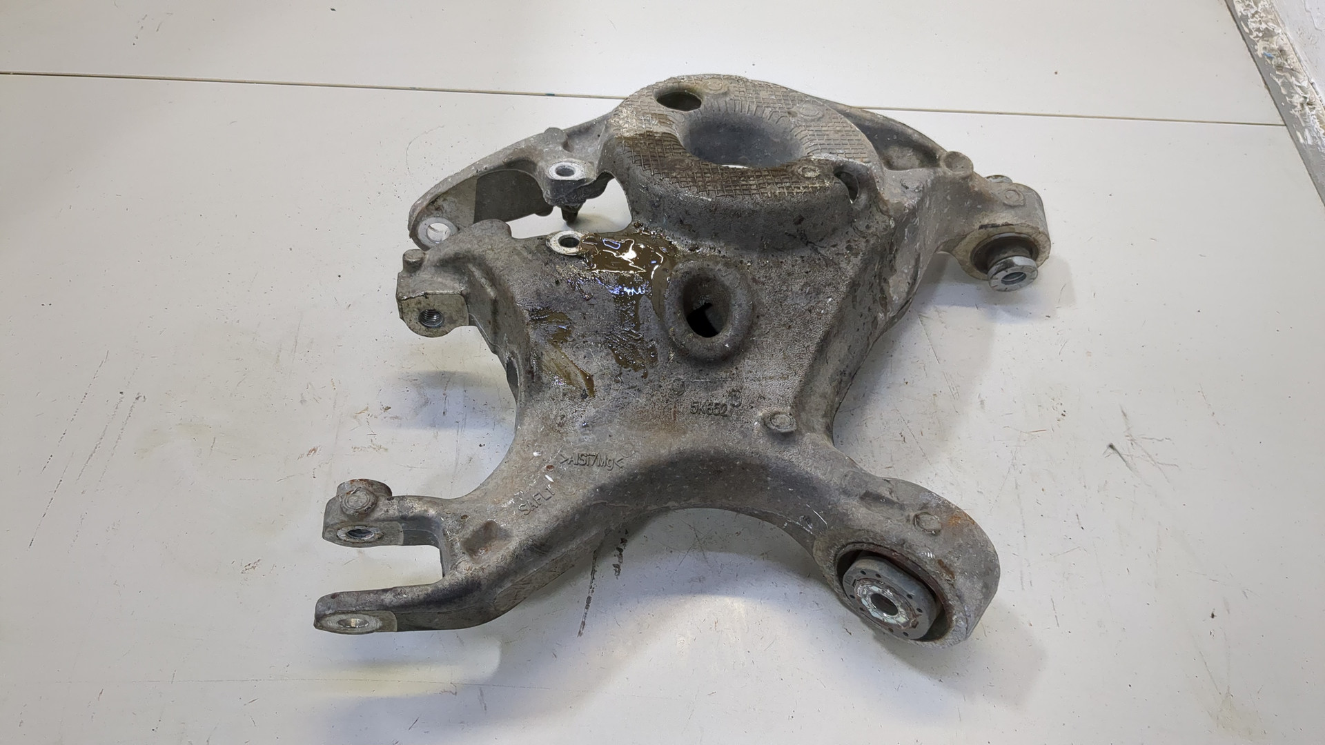 Рычаг задний левый