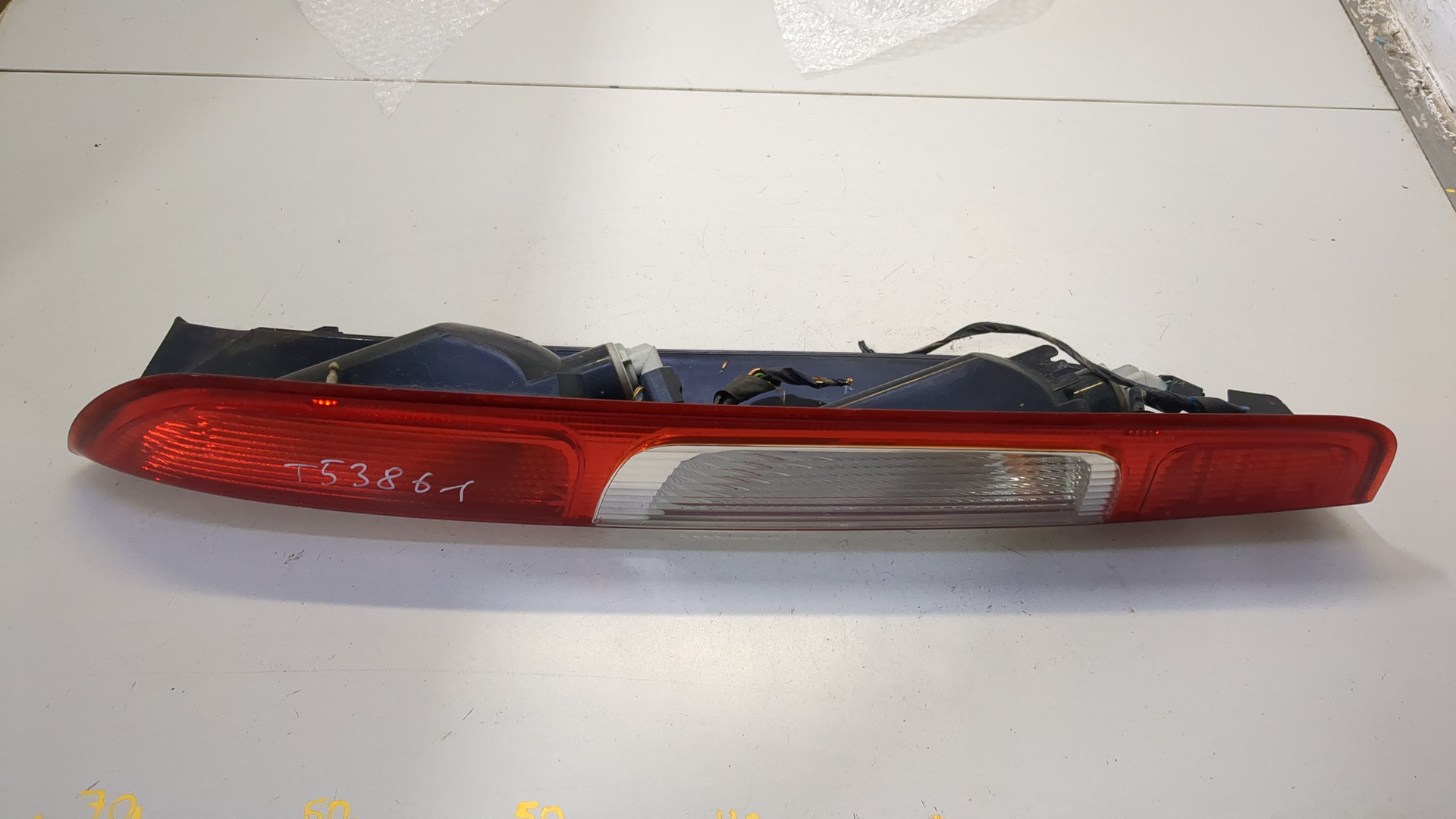 Фонарь задний левый