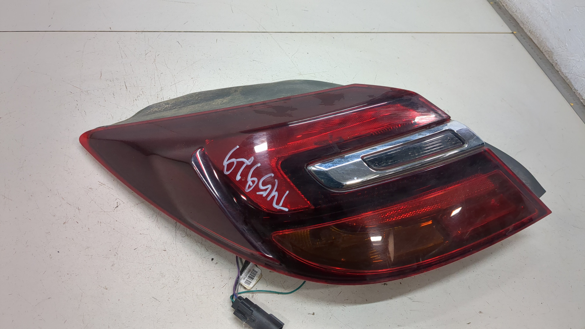 Фонарь задний левый