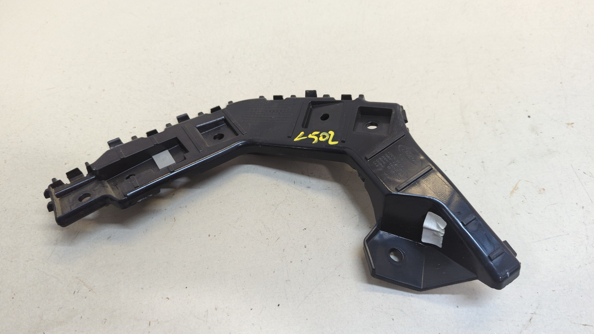 Кронштейн заднего бампера левый