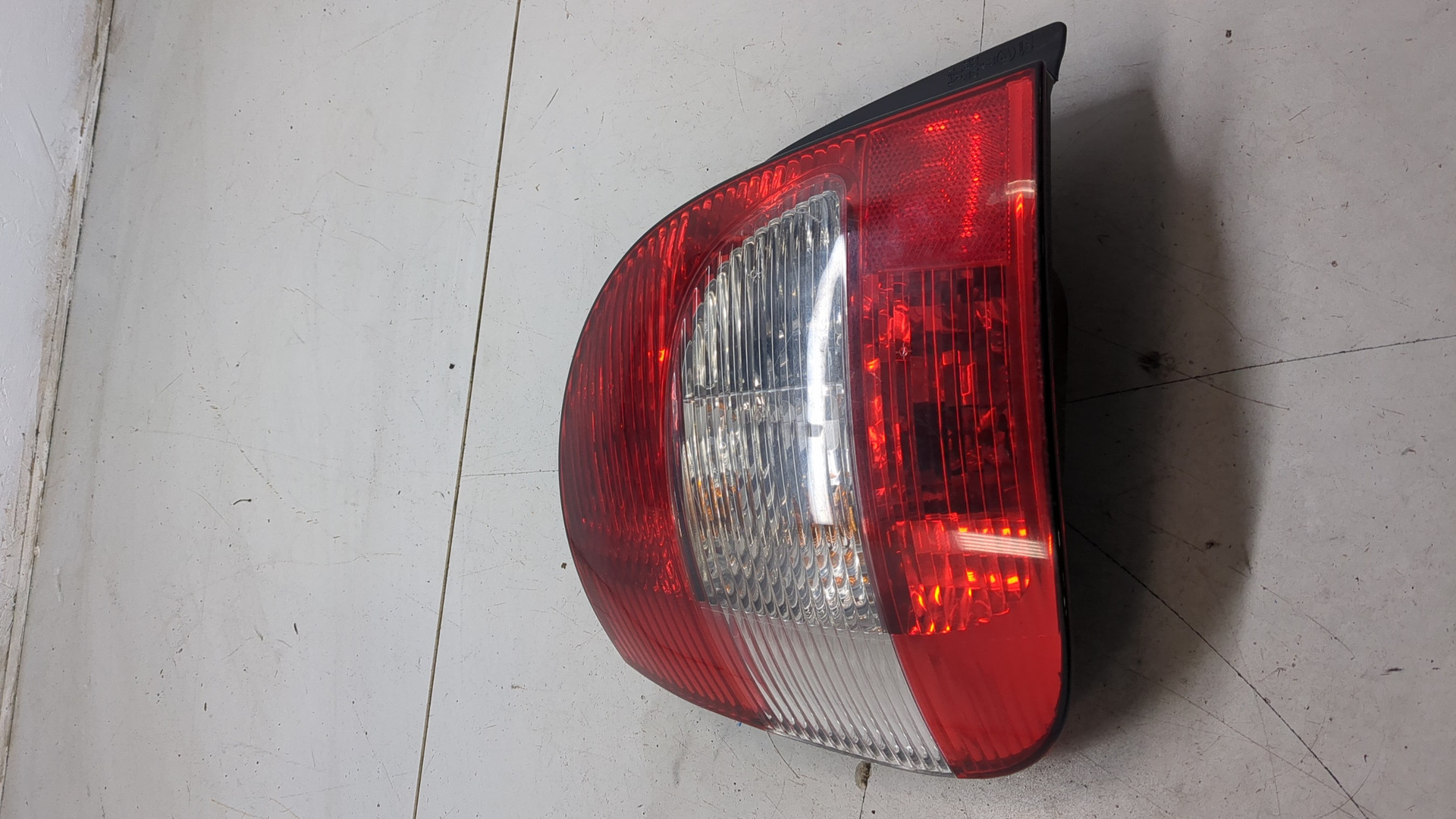 Фонарь задний левый