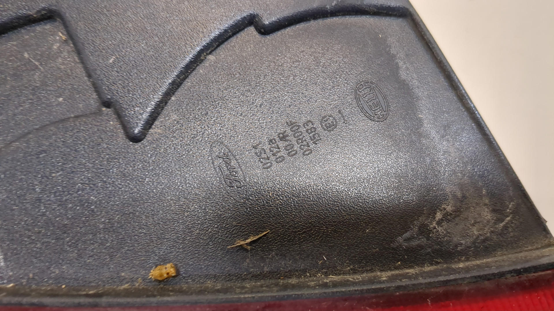 Фонарь задний левый