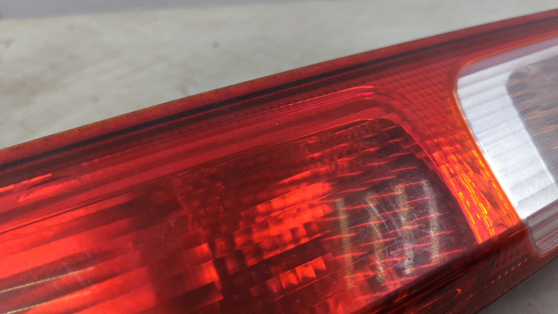 Фонарь задний левый