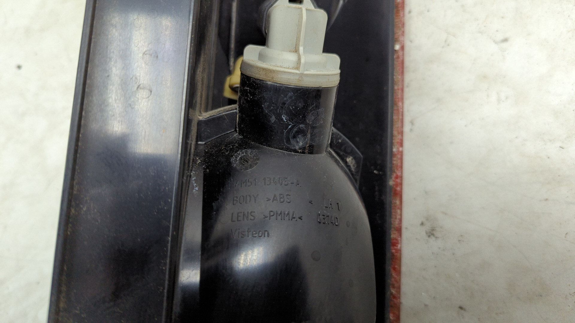 Фонарь задний левый