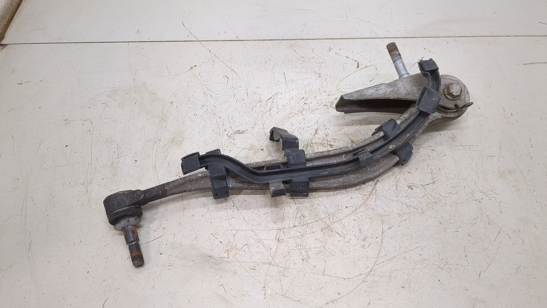 Рычаг задний левый