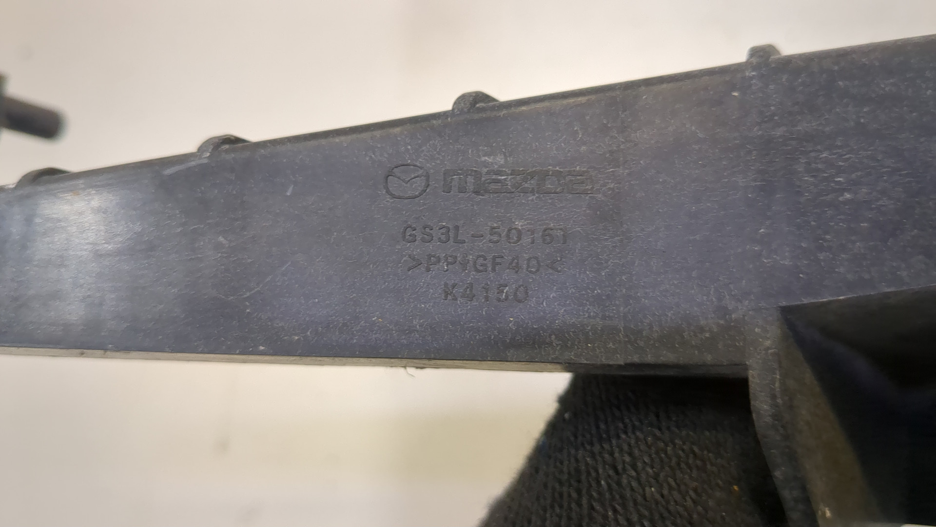 Кронштейн фар левый