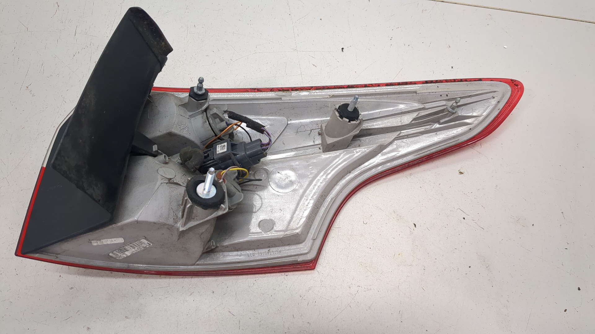 Фонарь задний левый