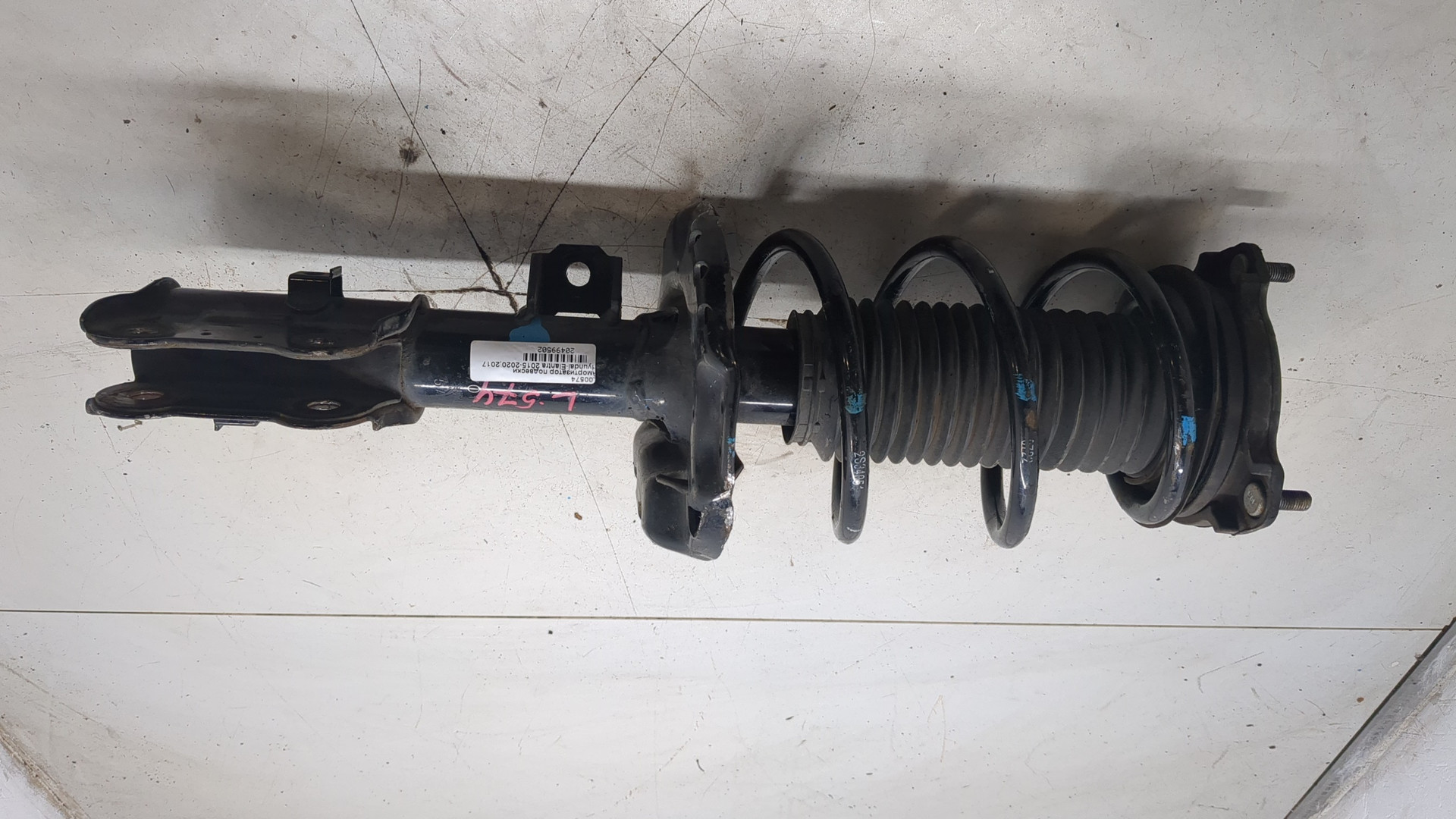 Амортизатор передний левый