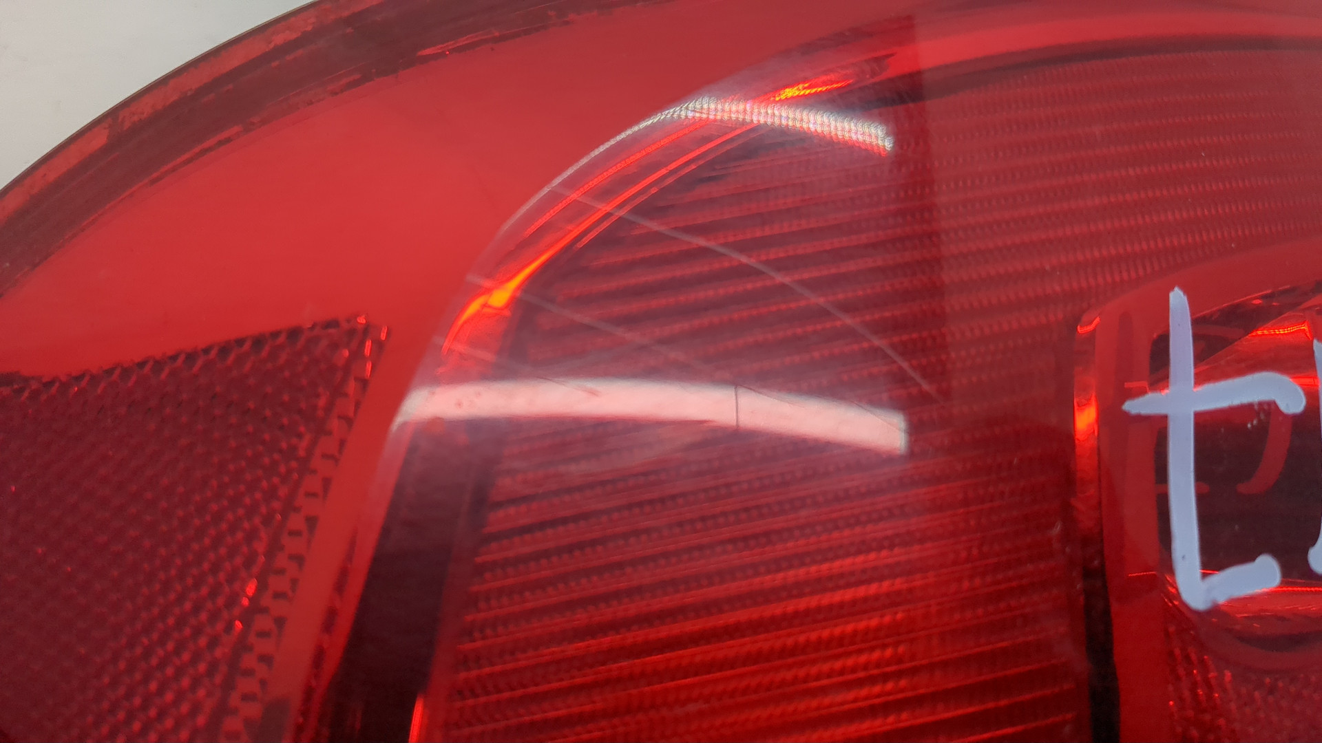 Фонарь задний левый