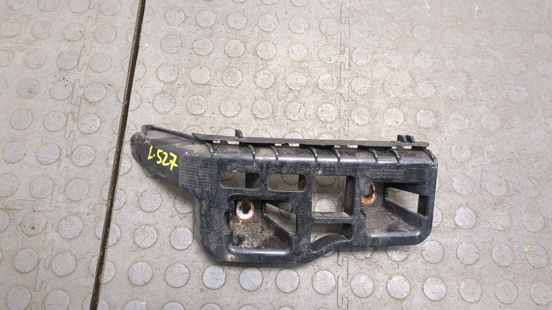 Кронштейн заднего бампера левый