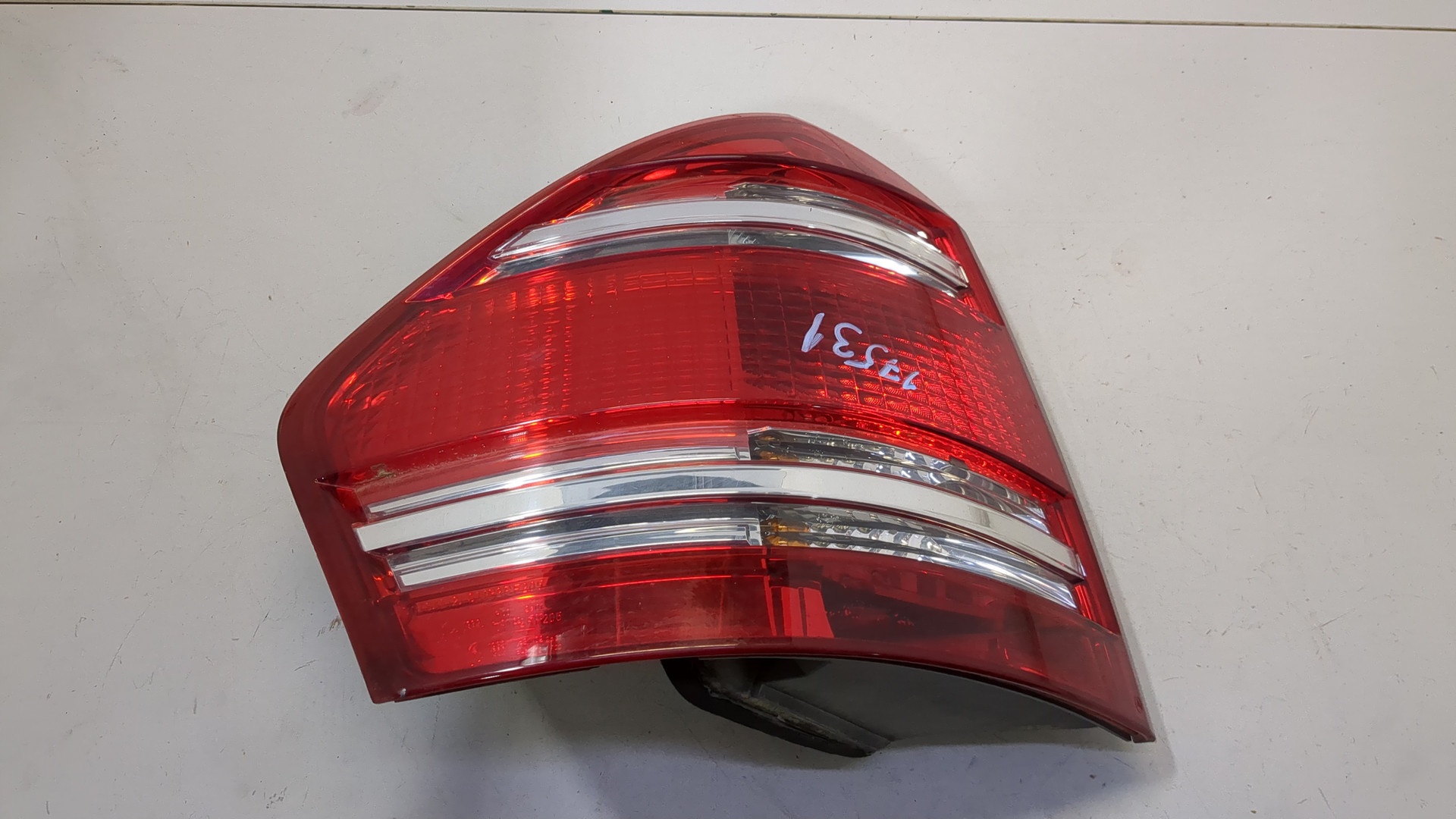 Фонарь задний левый