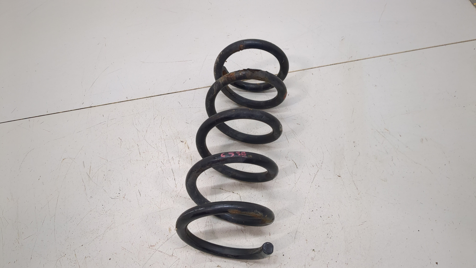 Пружина задняя