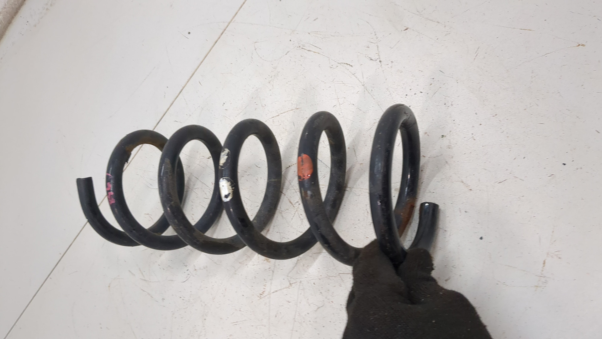 Пружина задняя