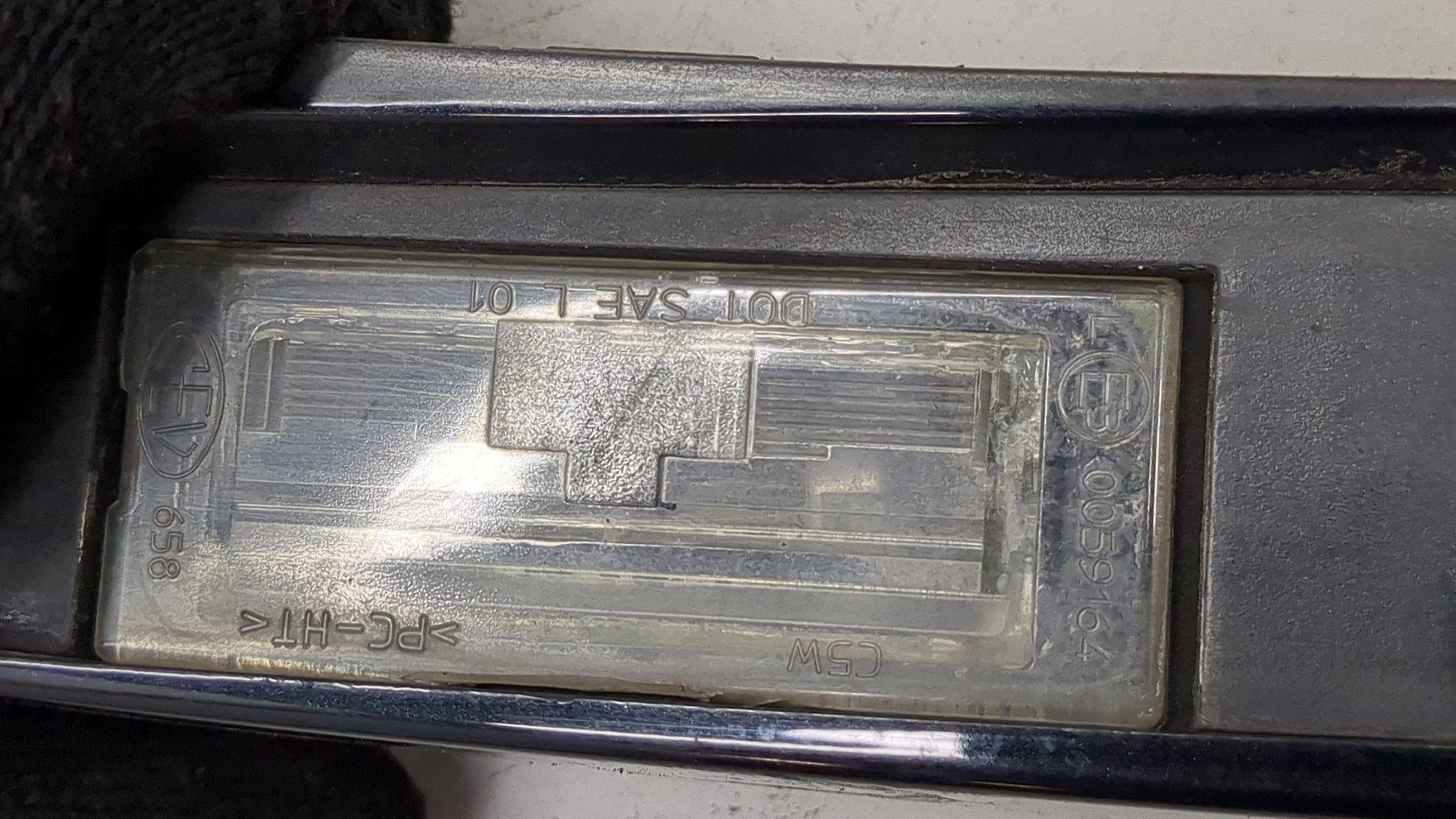 Фонарь подсветки номера