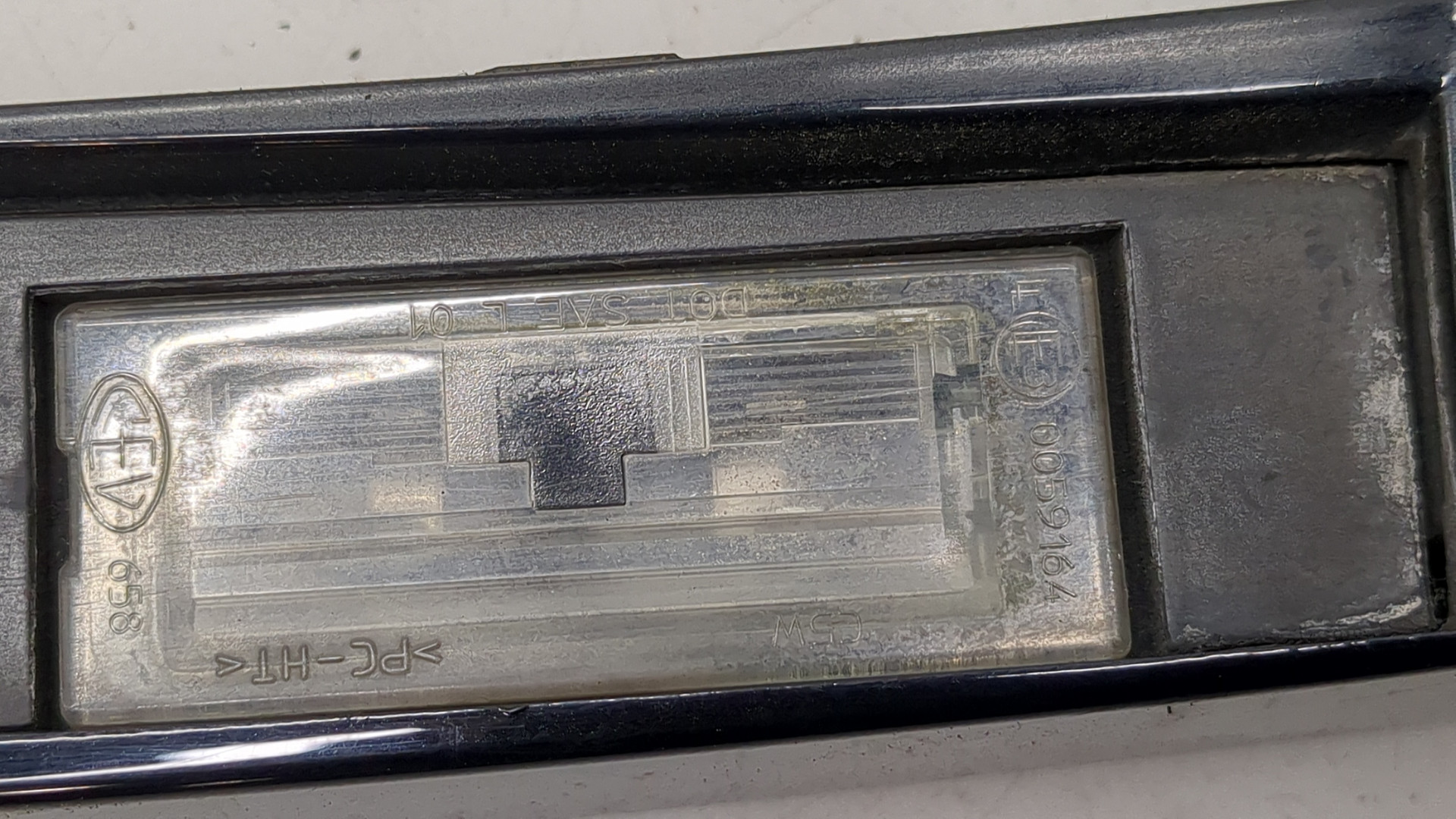 Фонарь подсветки номера