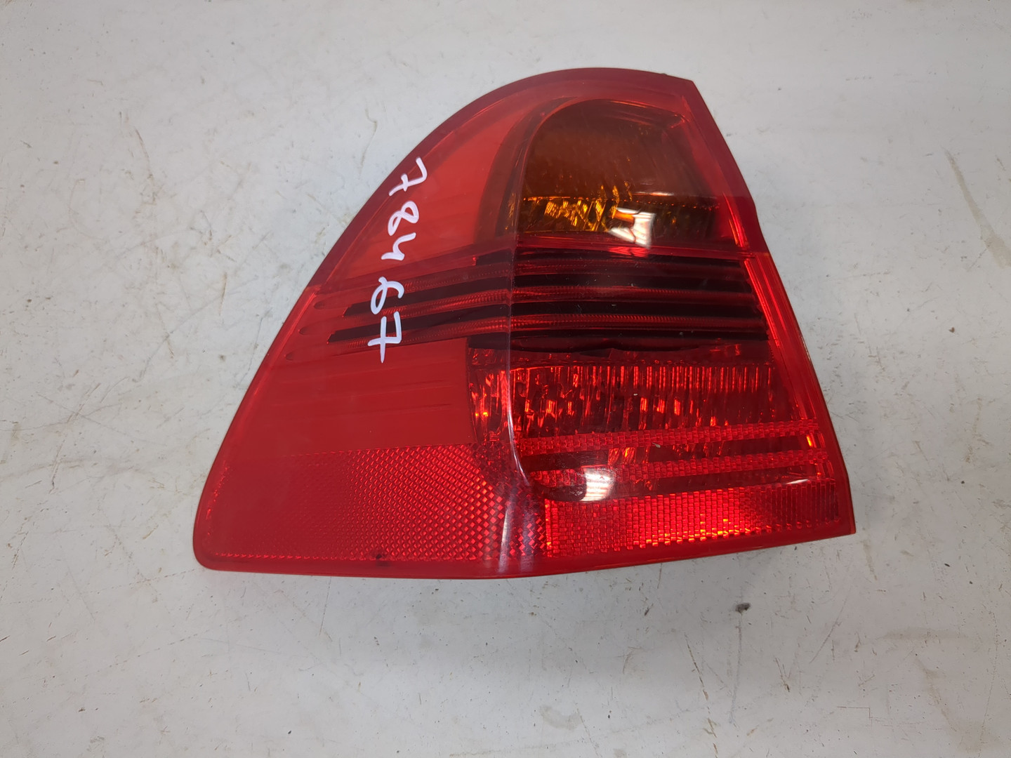 Фонарь задний левый