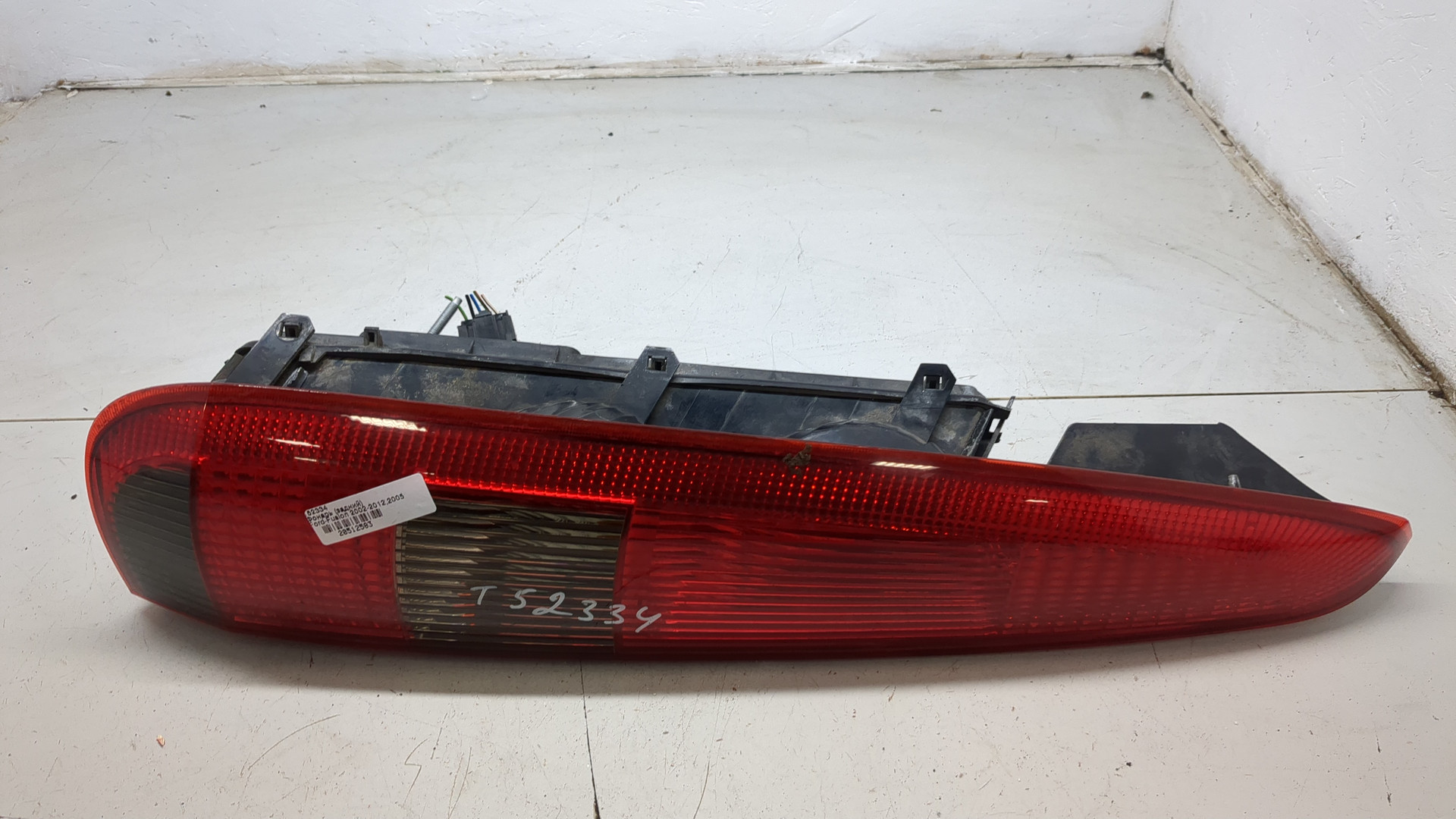 Фонарь задний левый