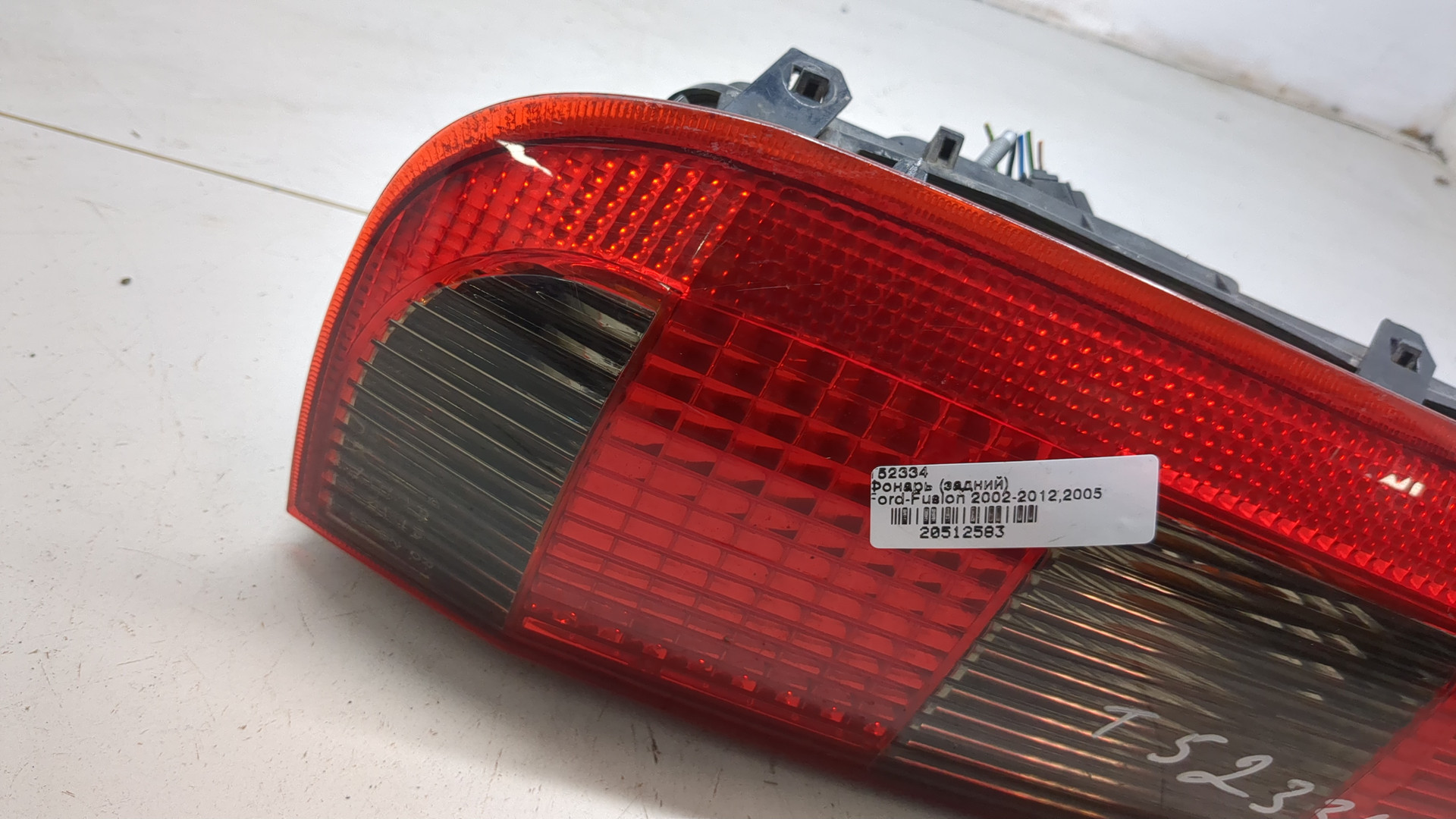 Фонарь задний левый