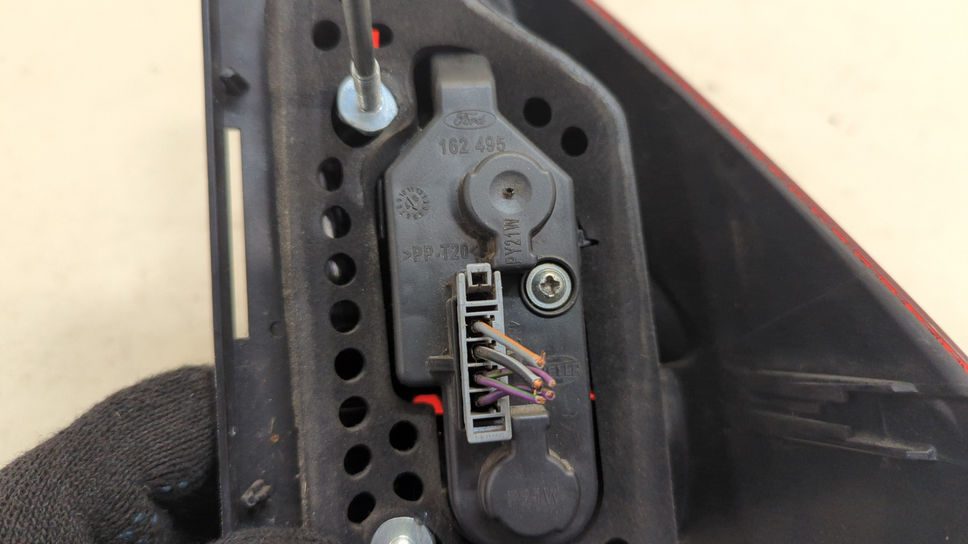 Фонарь задний левый