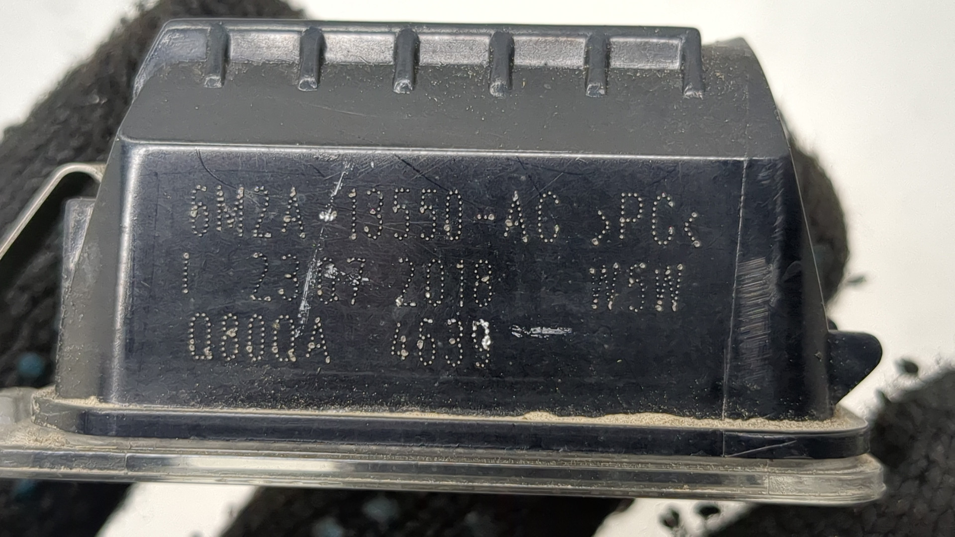 Фонарь подсветки номера