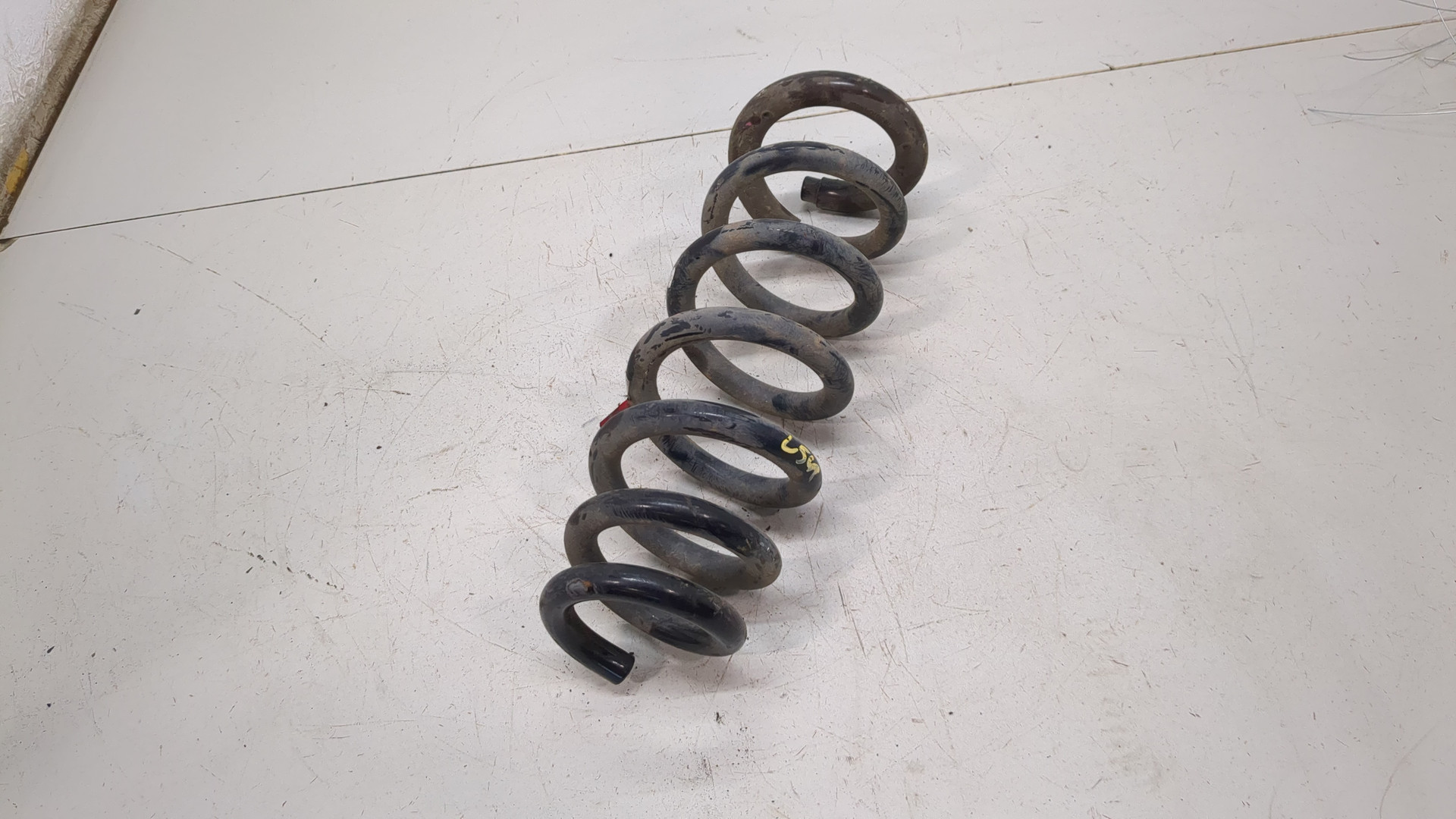 Пружина задняя