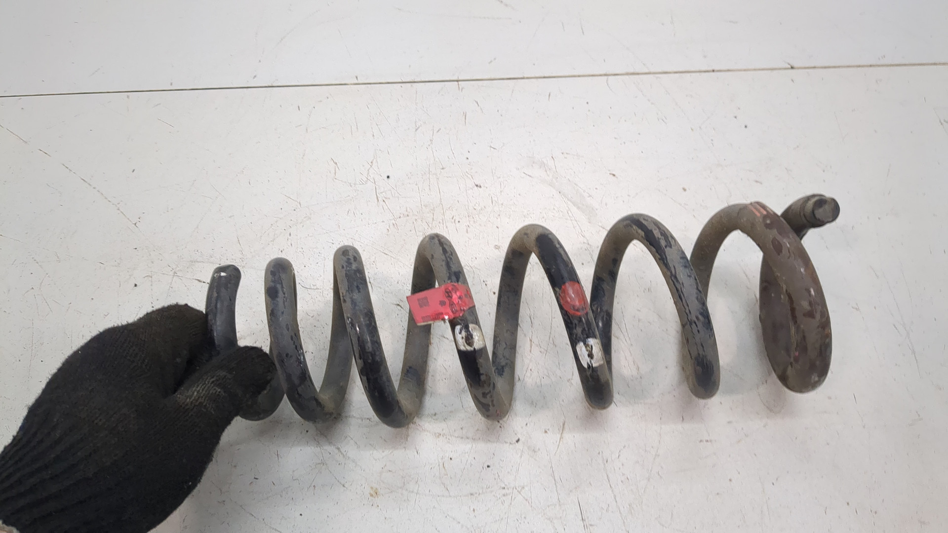 Пружина задняя