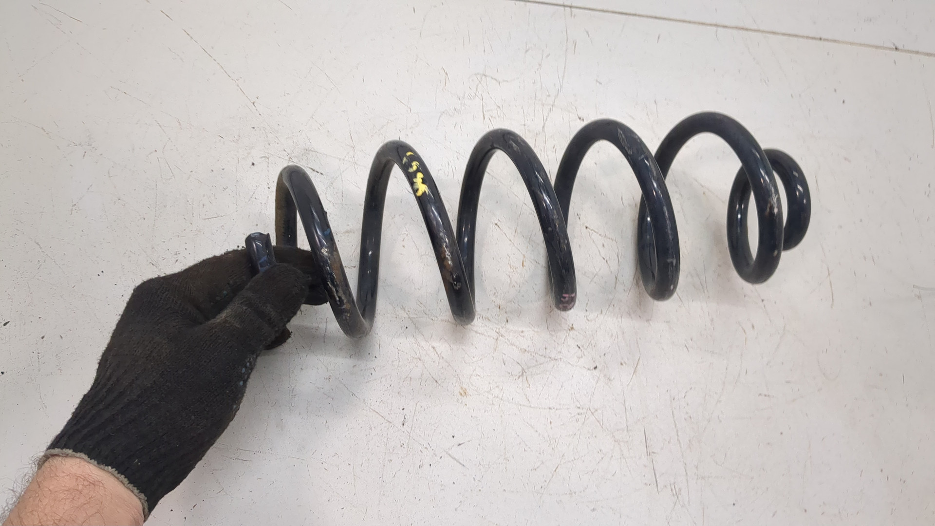 Пружина задняя