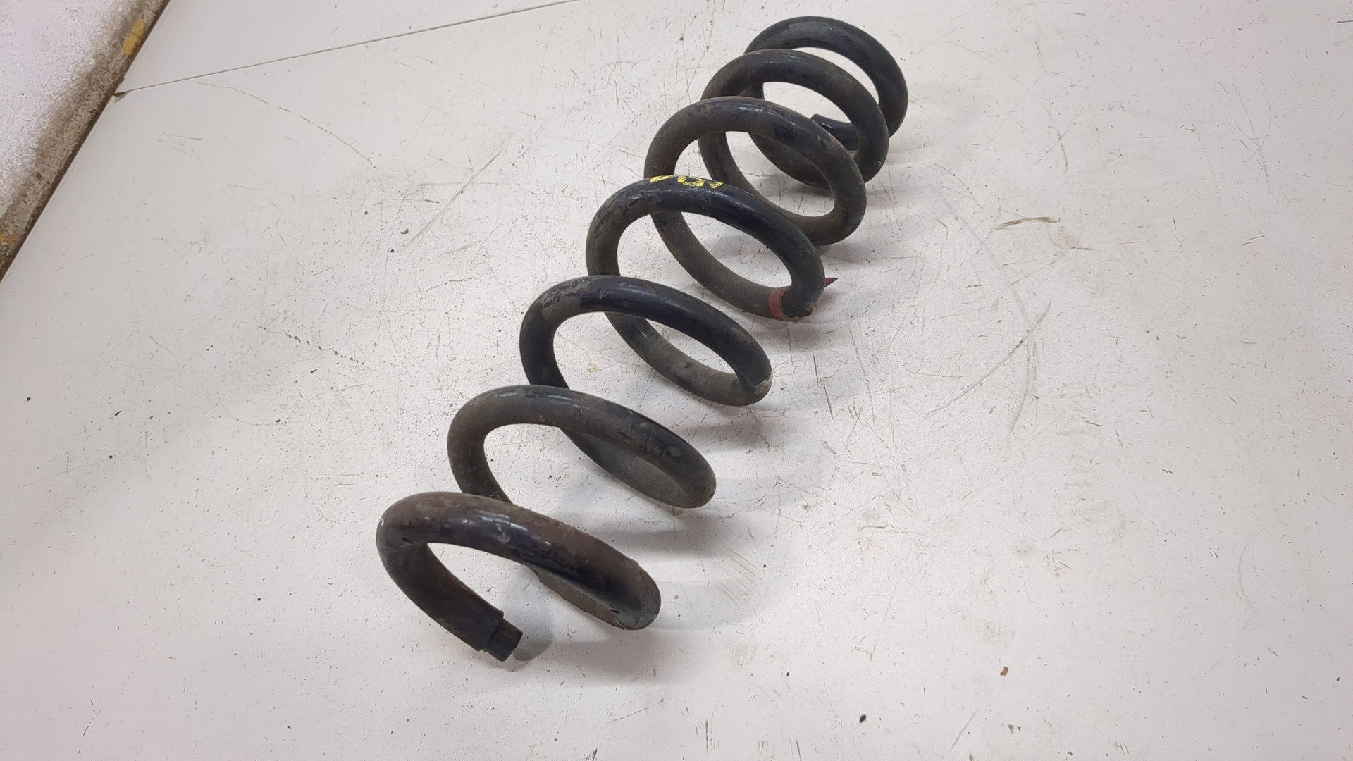 Пружина задняя