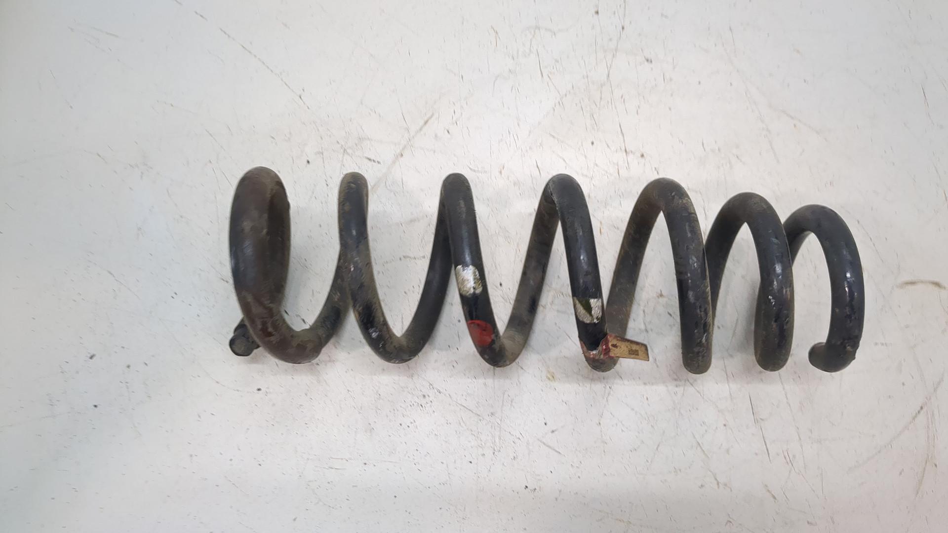 Пружина задняя