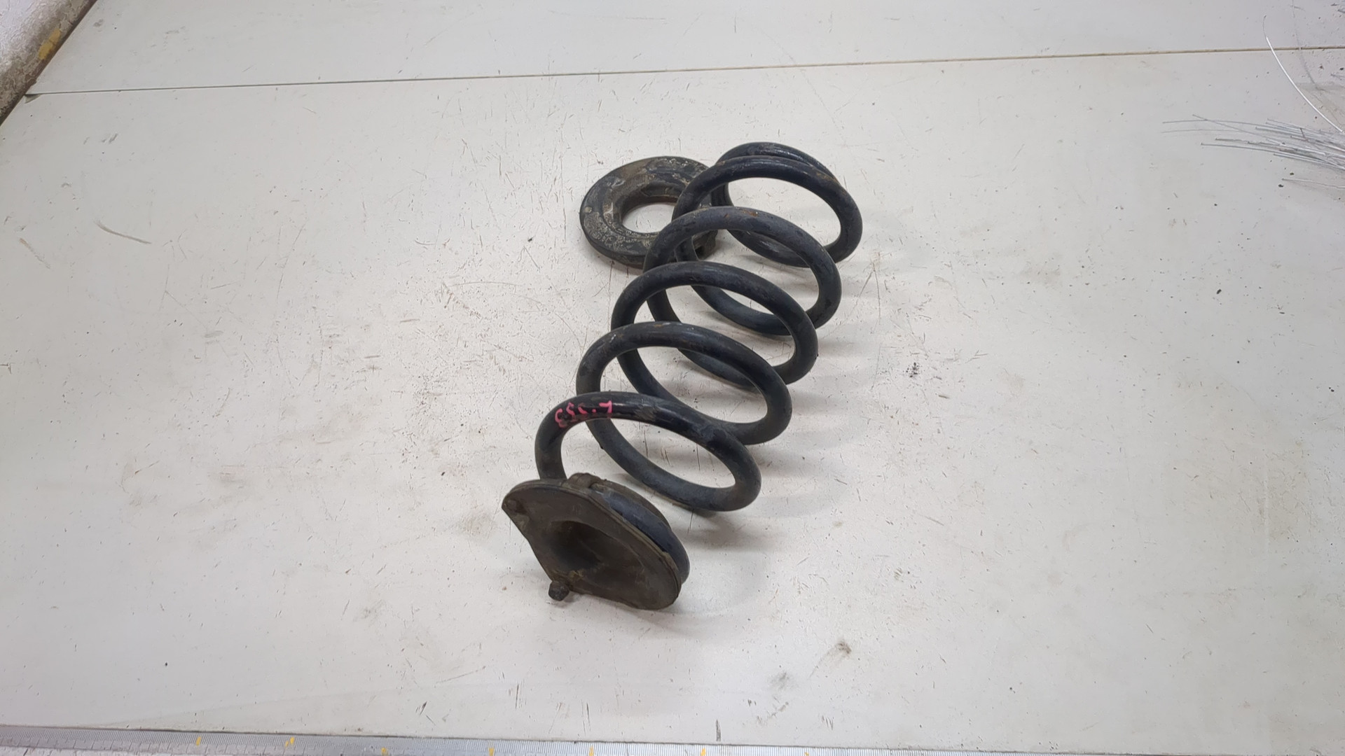 Пружина задняя