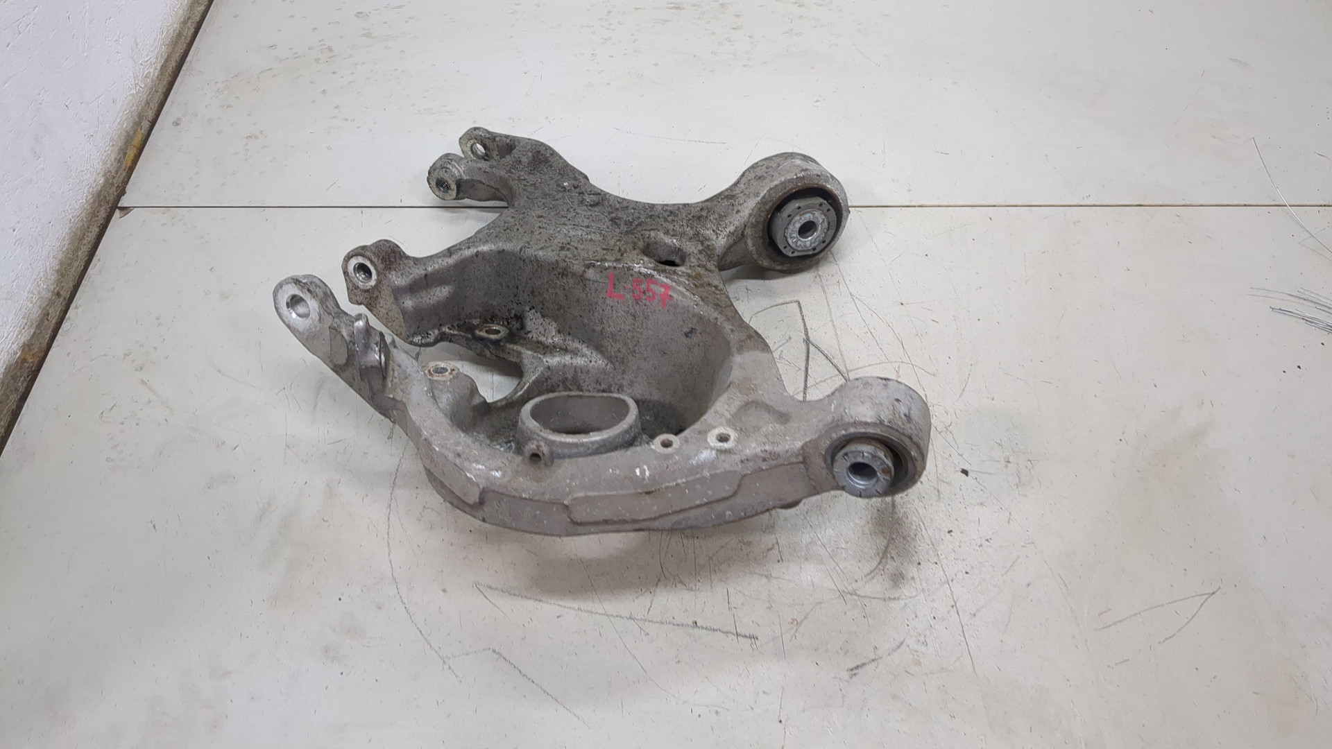 Рычаг задний левый