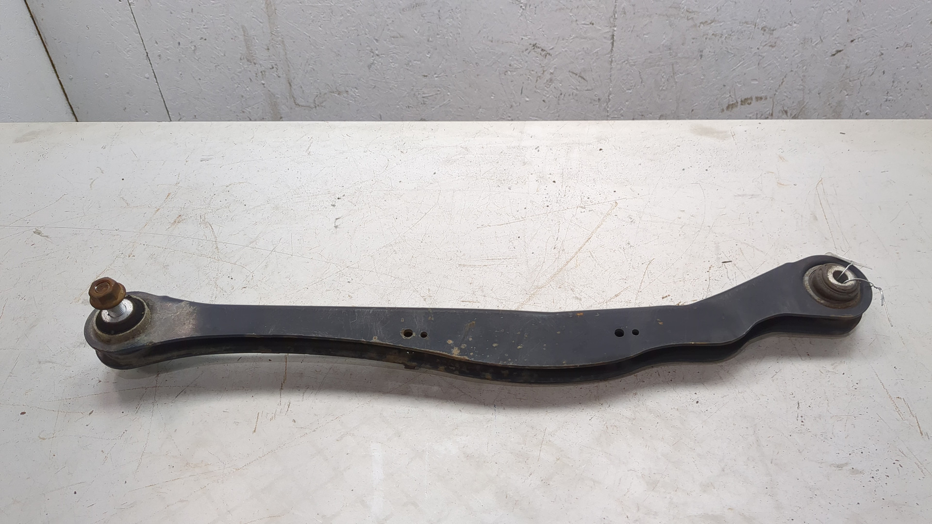 Рычаг задний левый
