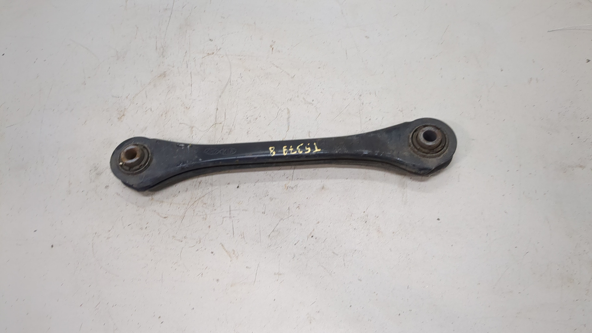 Рычаг задний левый